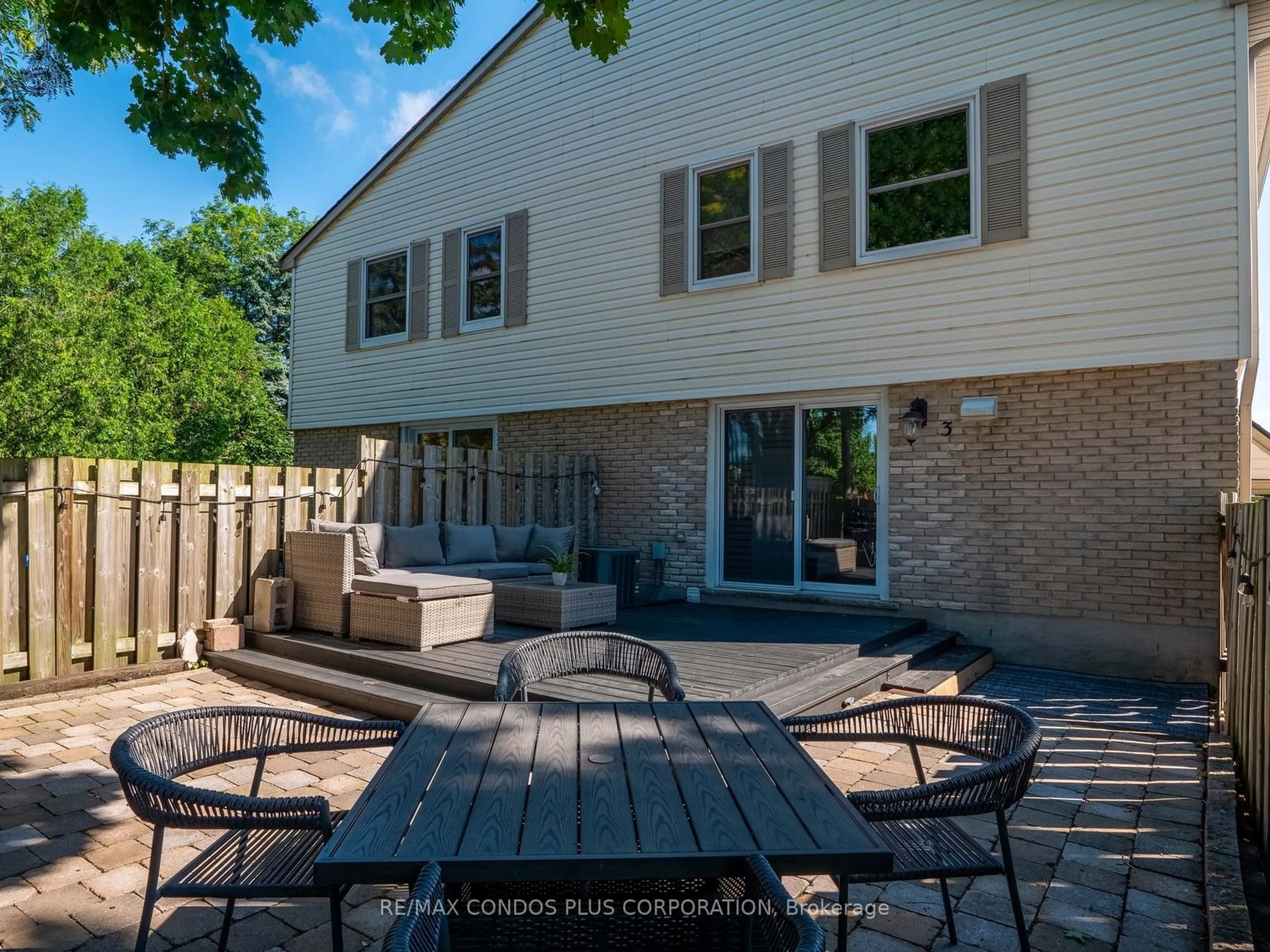 Patio, the fenced backyard for 1300 Upper Ottawa St #3, Hamilton Ontario L8W 1M8