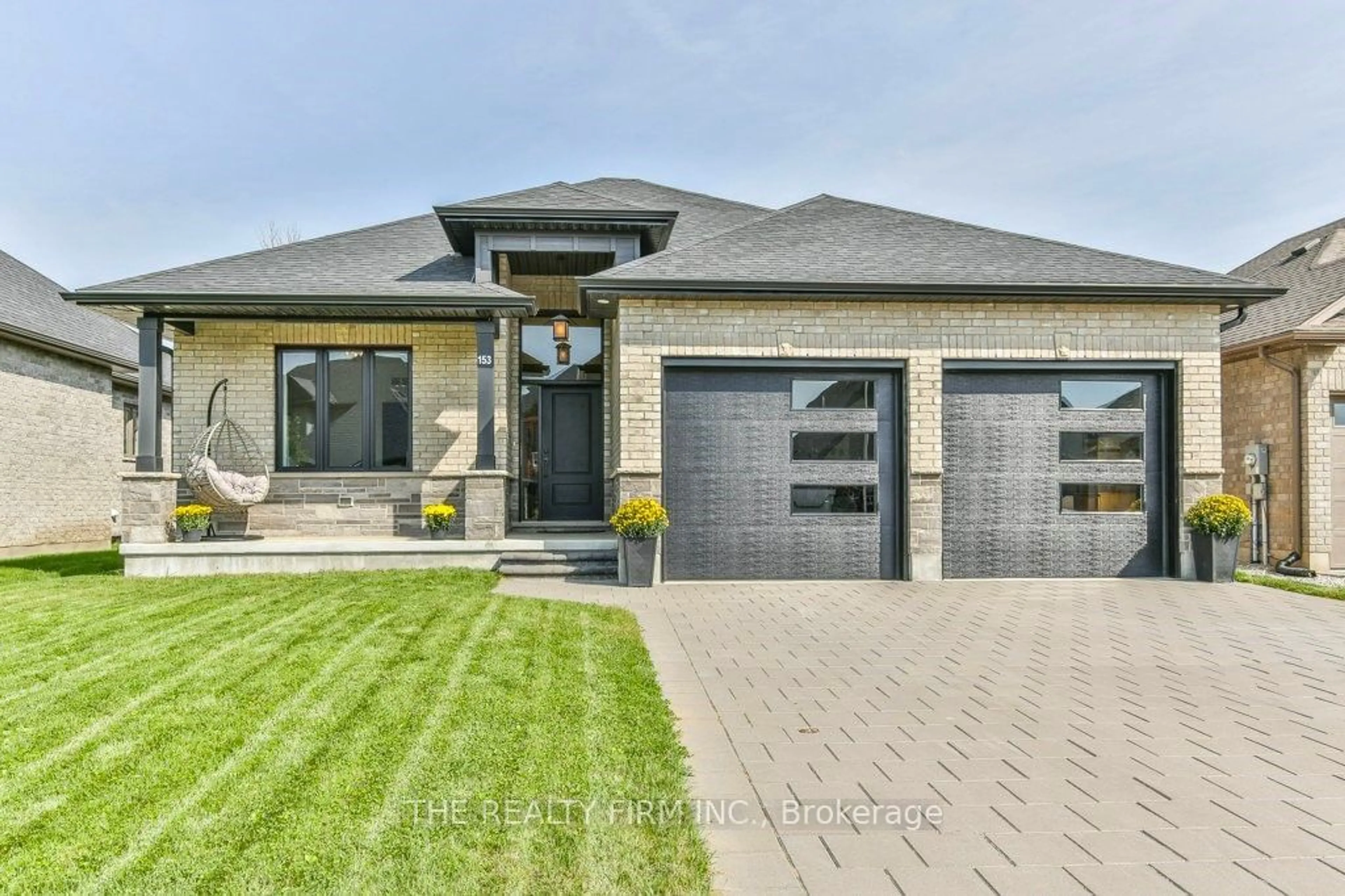 Home with brick exterior material for 153 Collins Way, Strathroy-Caradoc Ontario N7G 0G2