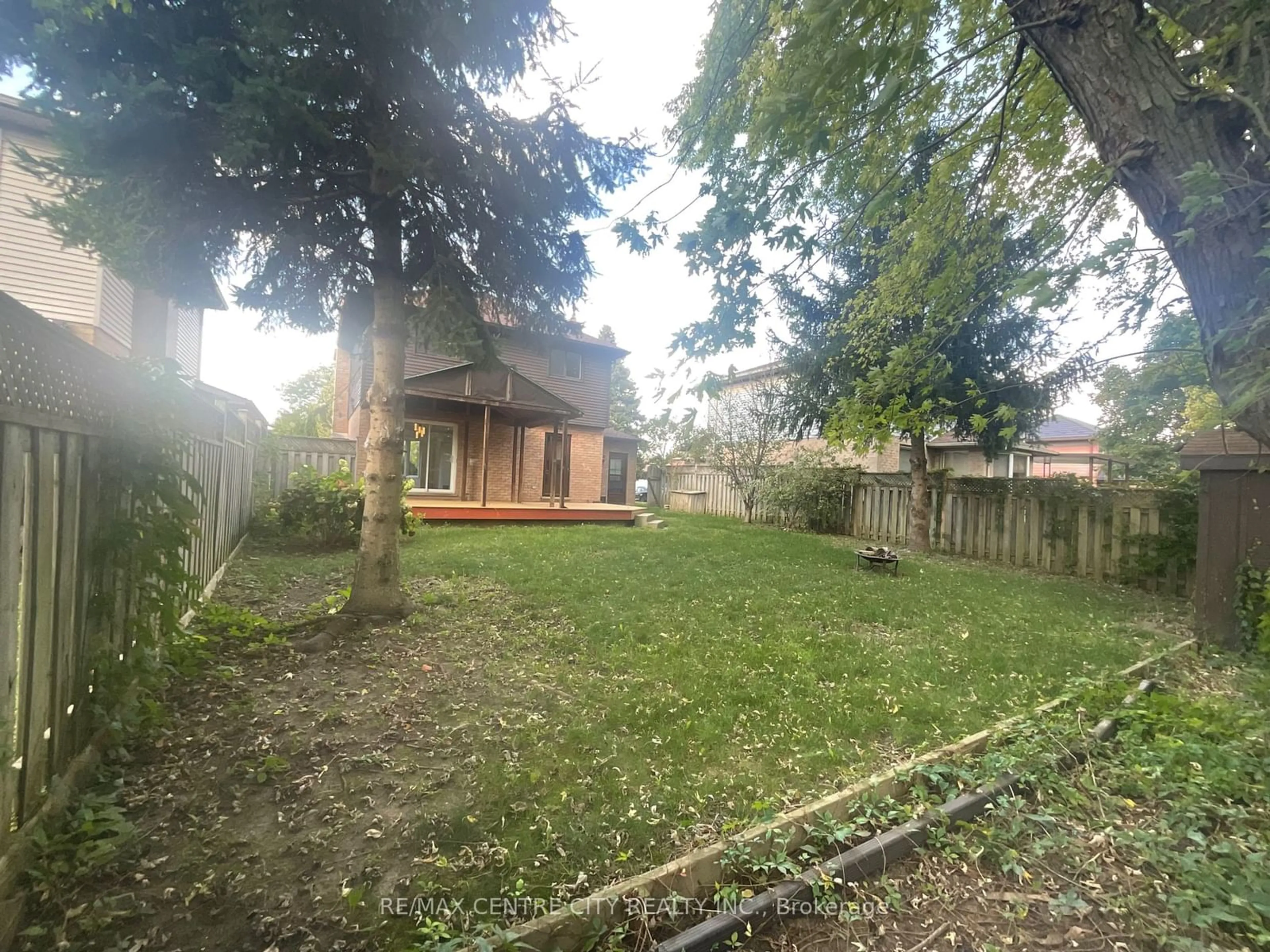 Frontside or backside of a home, the fenced backyard for 969 Apache Rd, London Ontario N5V 2V7