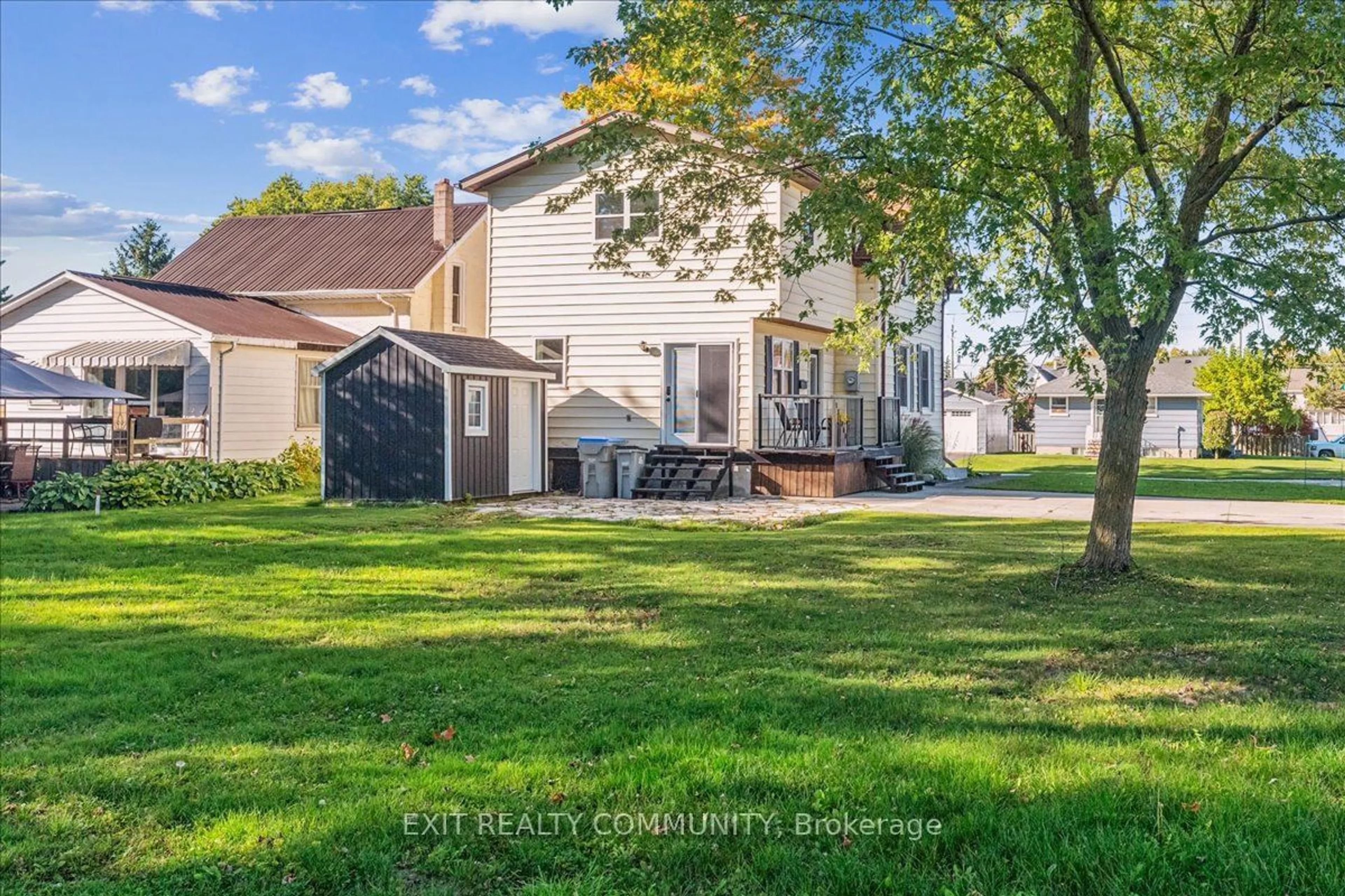 Frontside or backside of a home, the fenced backyard for 21 Edward St, Bluewater Ontario N0M 2T0