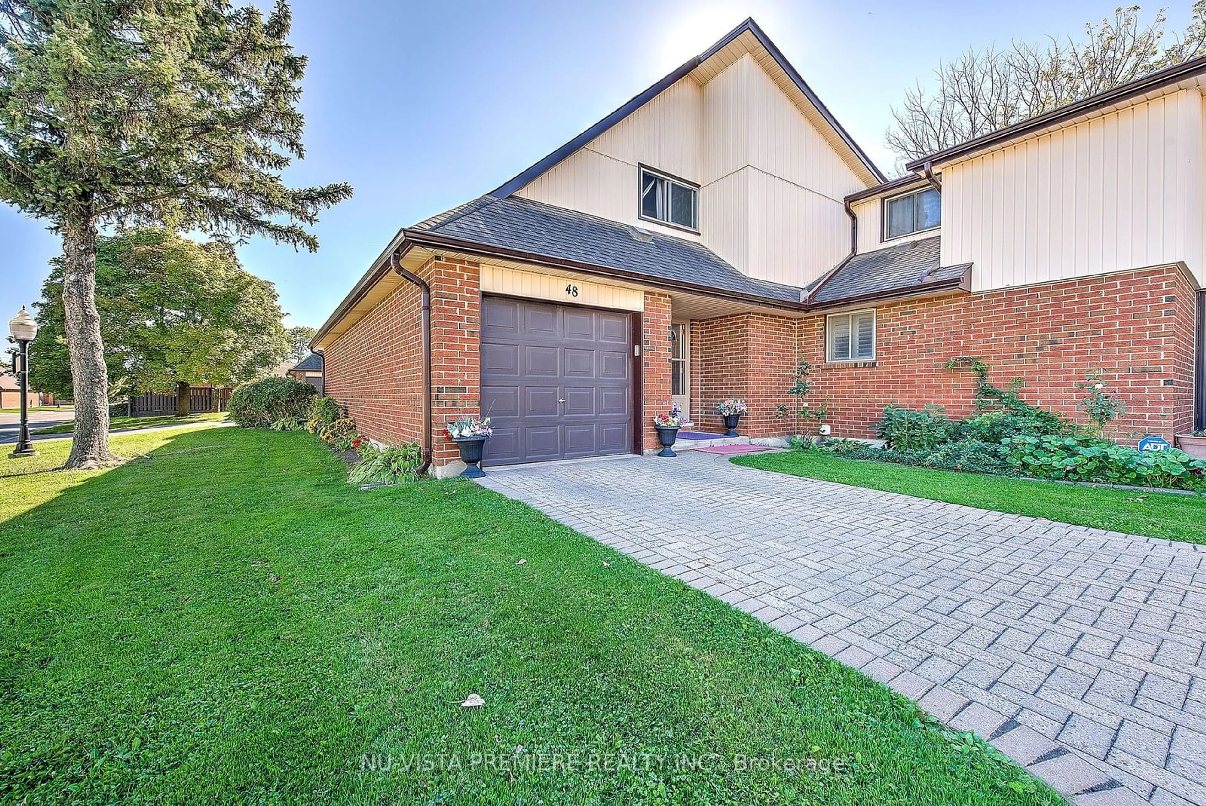 Home with brick exterior material for 971 Adelaide St #48, London Ontario N6E 2H3