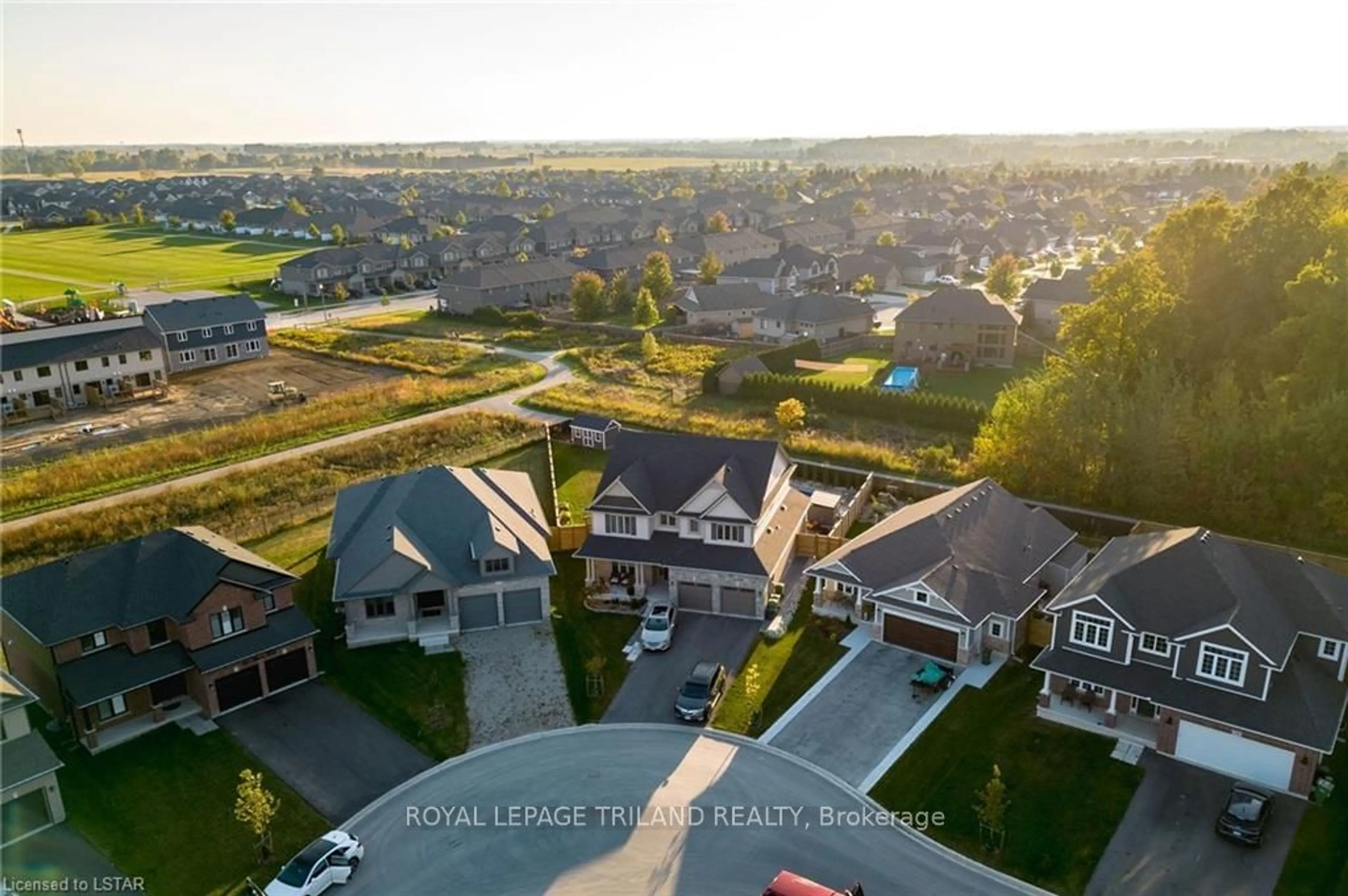 Frontside or backside of a home, the fenced backyard for 64 ACORN Tr, St. Thomas Ontario N5R 0H8