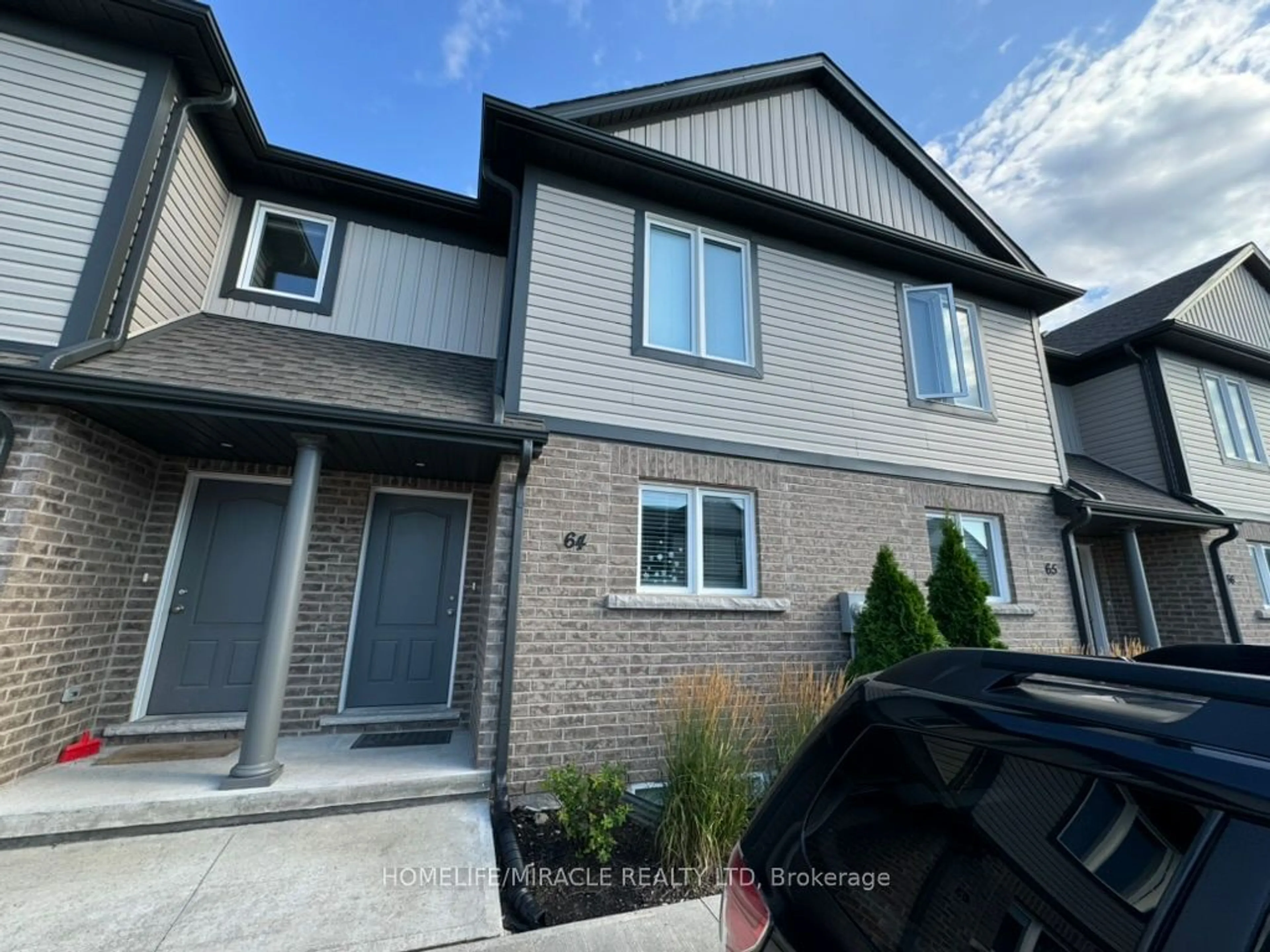 Frontside or backside of a home, the front or back of building for 7768 ASCOT Circ #64, Niagara Falls Ontario L2H 3P9