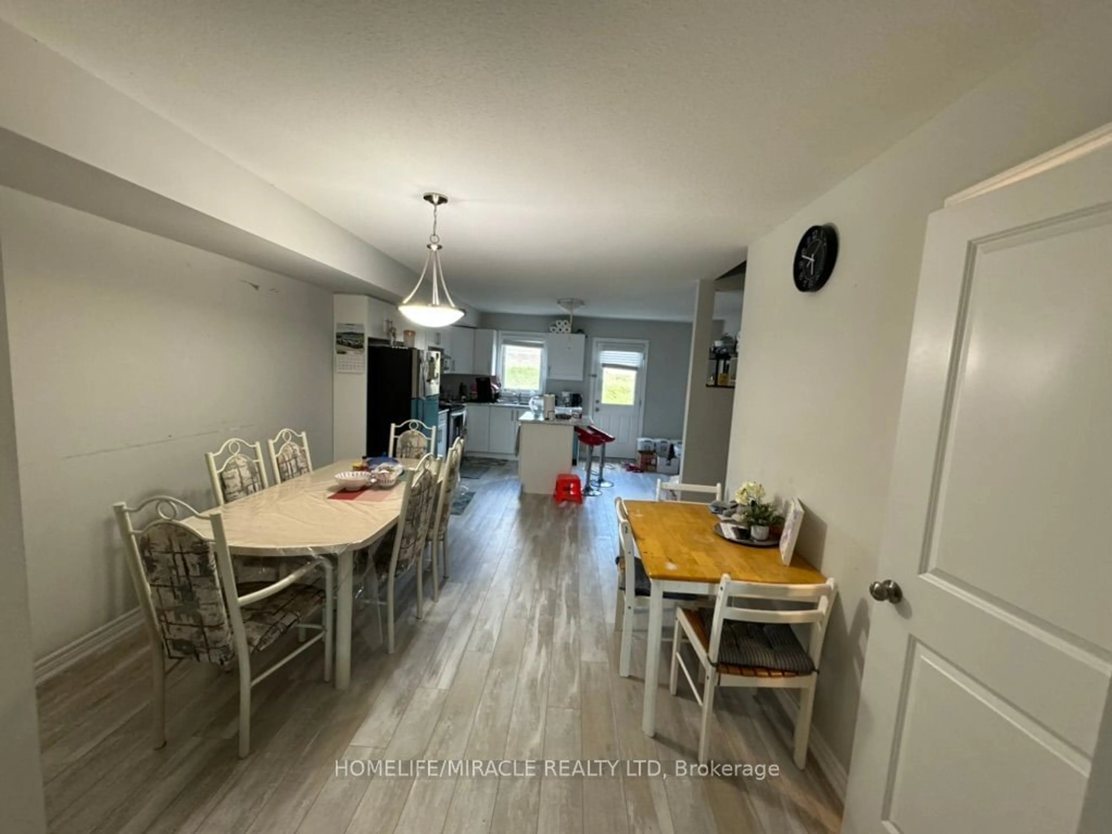 Dining room, wood floors, cottage for 7768 ASCOT Circ #64, Niagara Falls Ontario L2H 3P9