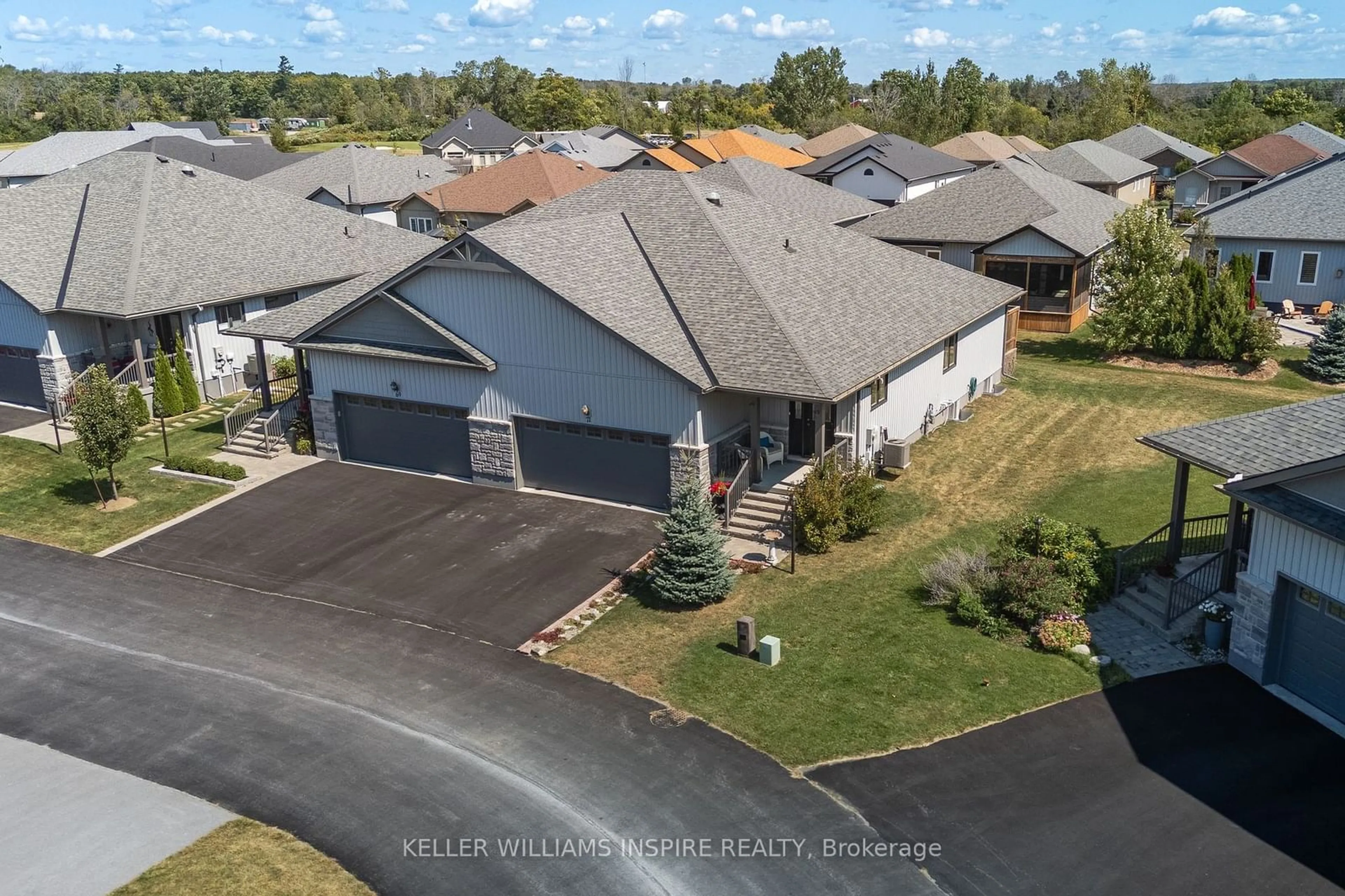 Frontside or backside of a home, the street view for 71 Conger Dr, Prince Edward County Ontario K0K 3L0