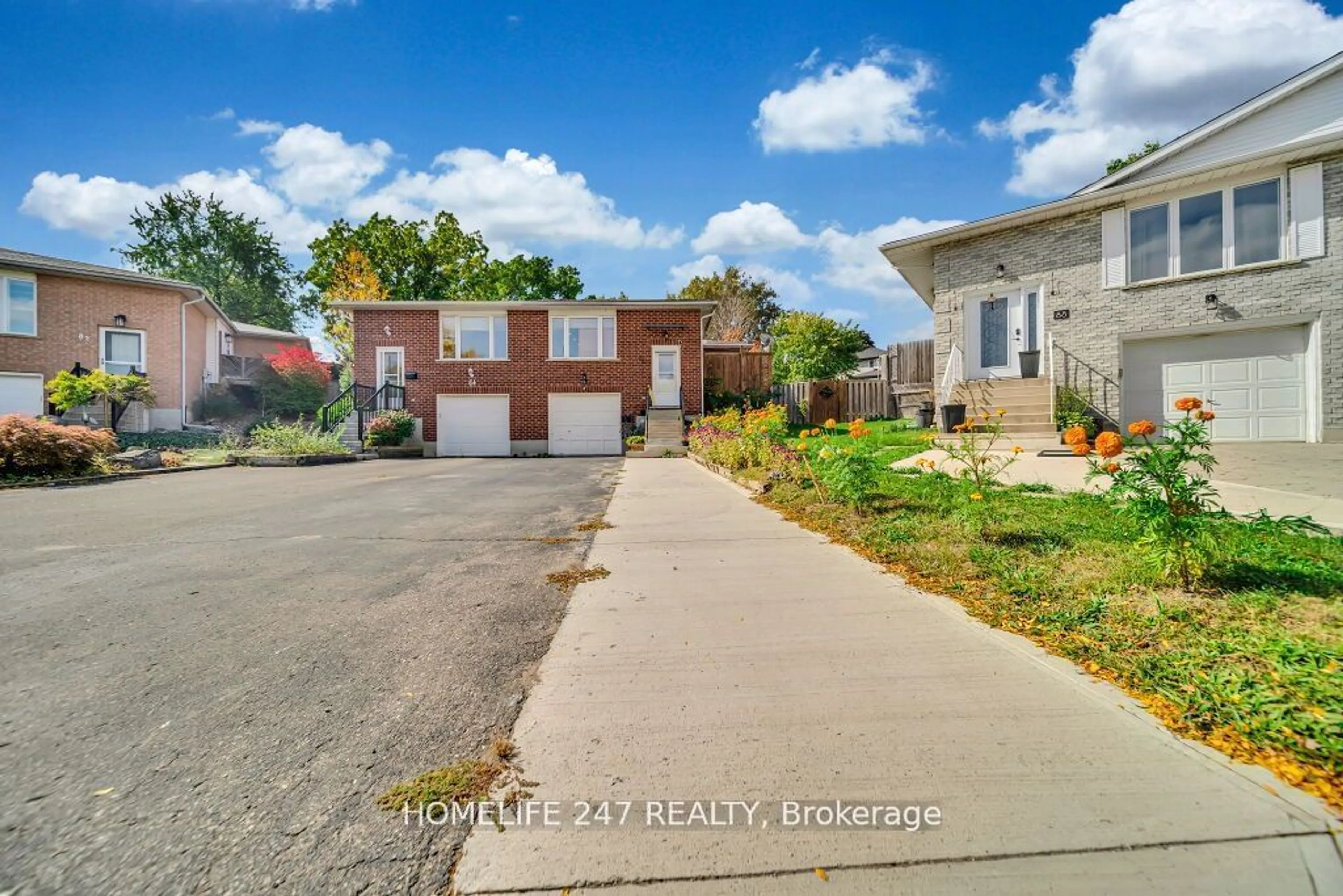 Frontside or backside of a home, the street view for 86 Old Huron Crt, Kitchener Ontario N2R 1L7