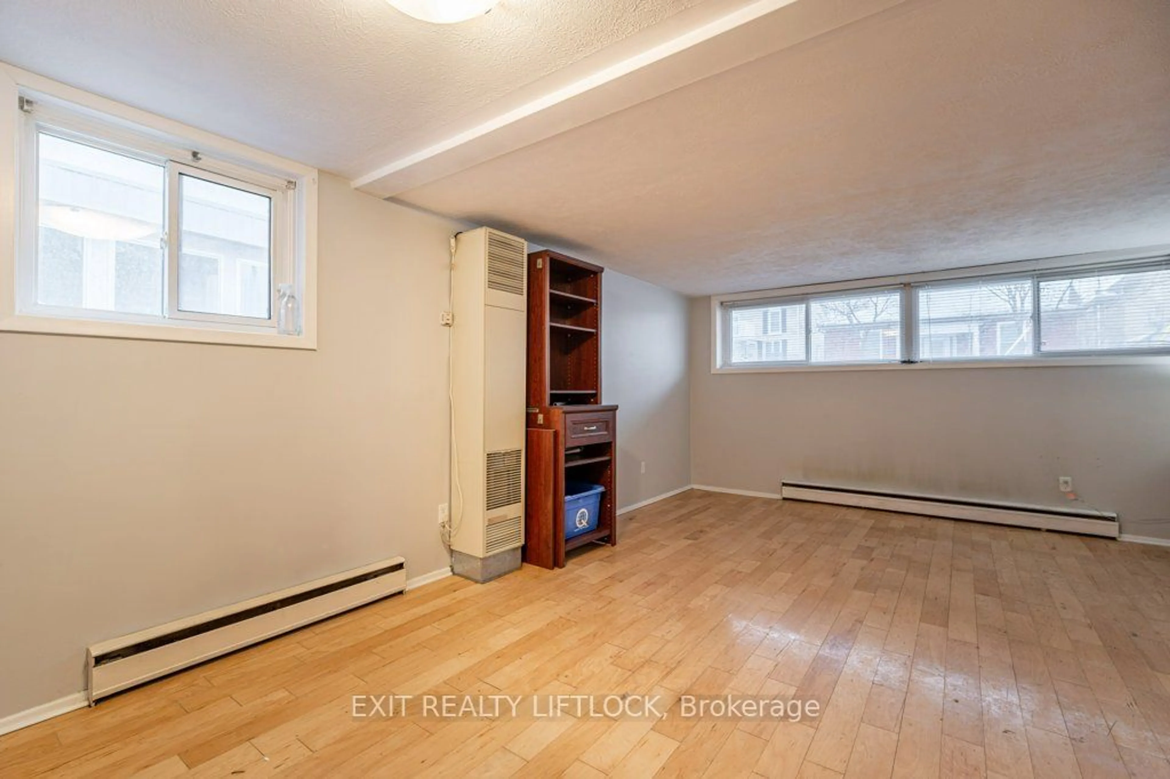 A pic of a room, wood floors for 289 Simcoe St, Peterborough Ontario K9H 2J4