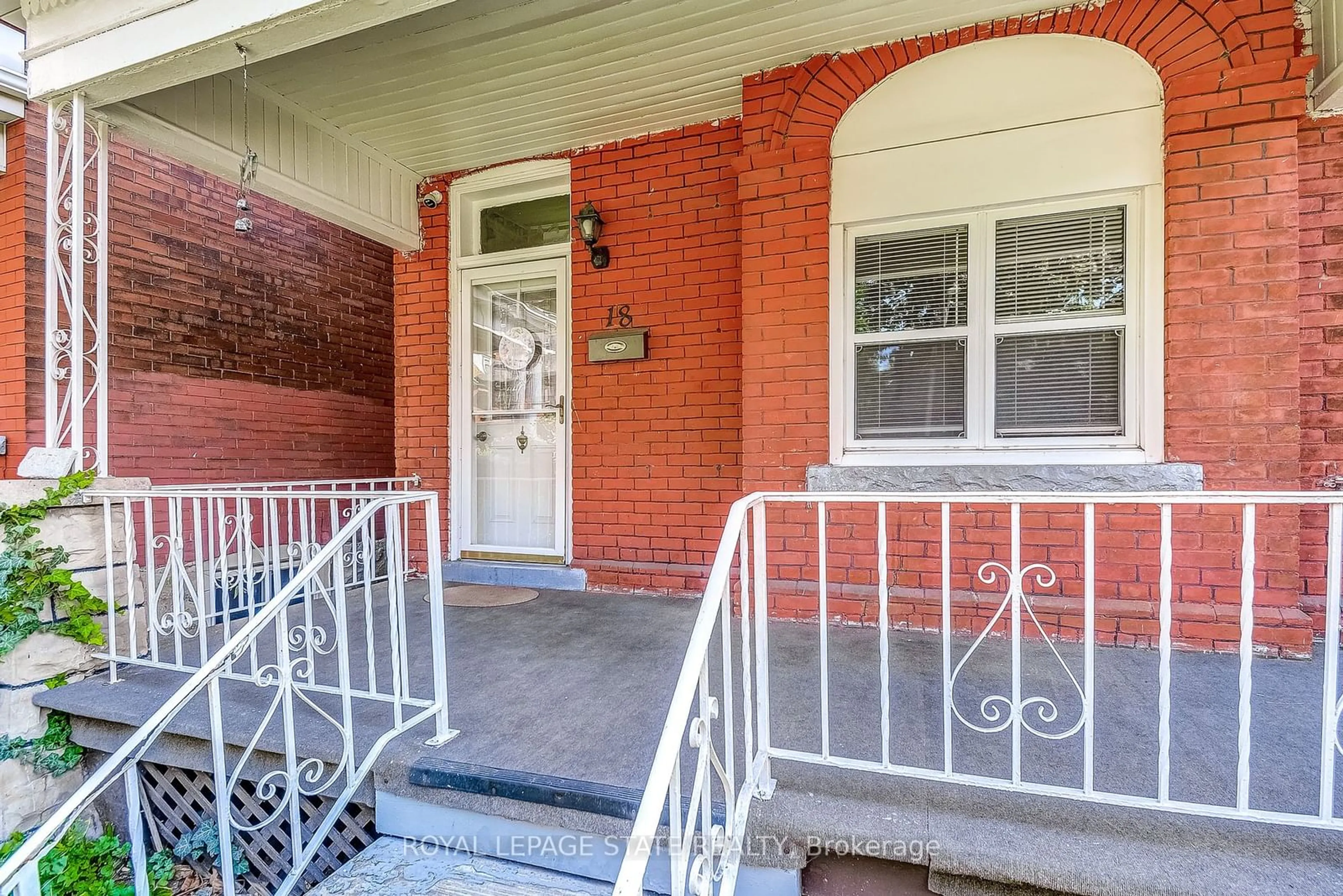 Home with brick exterior material for 18 Fairholt Rd, Hamilton Ontario L8M 2T1