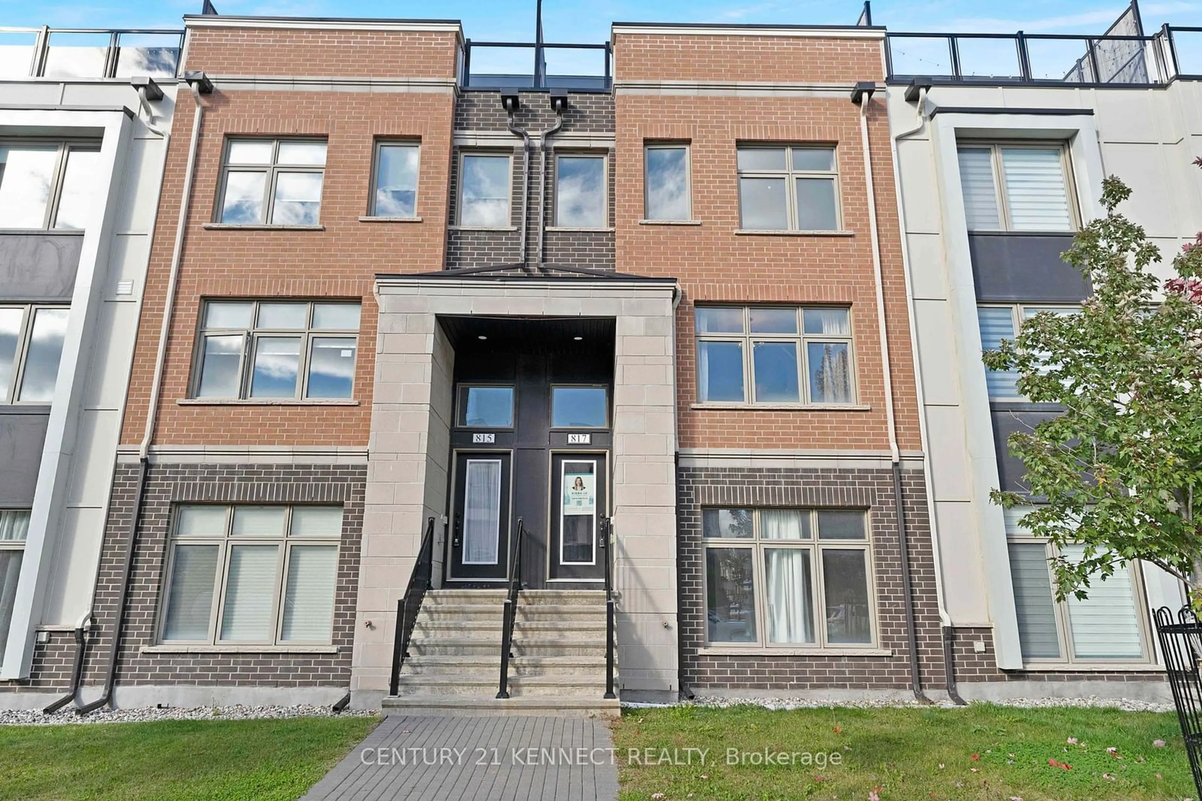 A pic from exterior of the house or condo, the front or back of building for 817 Mikinak Rd, Ottawa Ontario K1K 4Z9