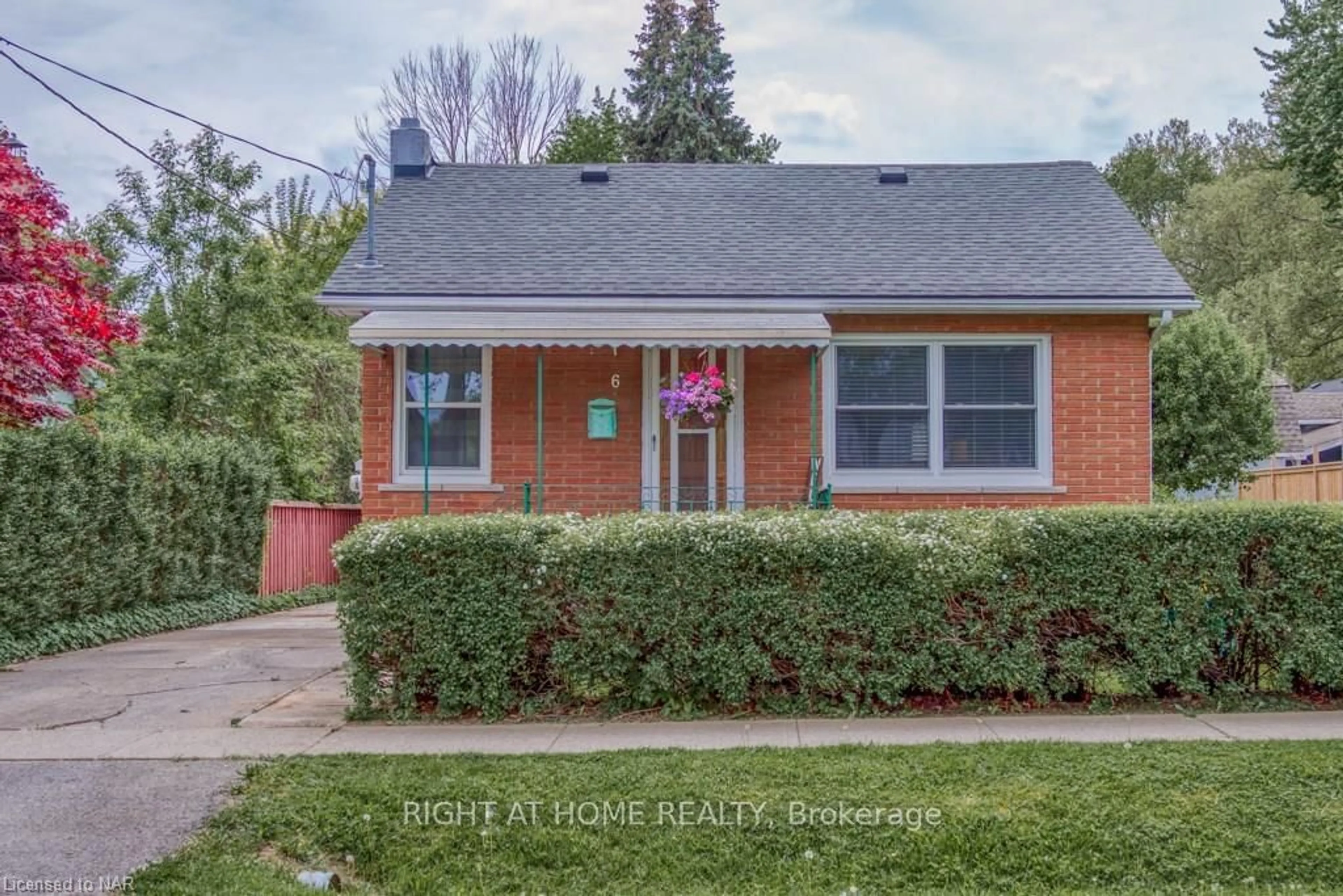 Frontside or backside of a home, the street view for 6 Perry St, St. Catharines Ontario L2R 1K8