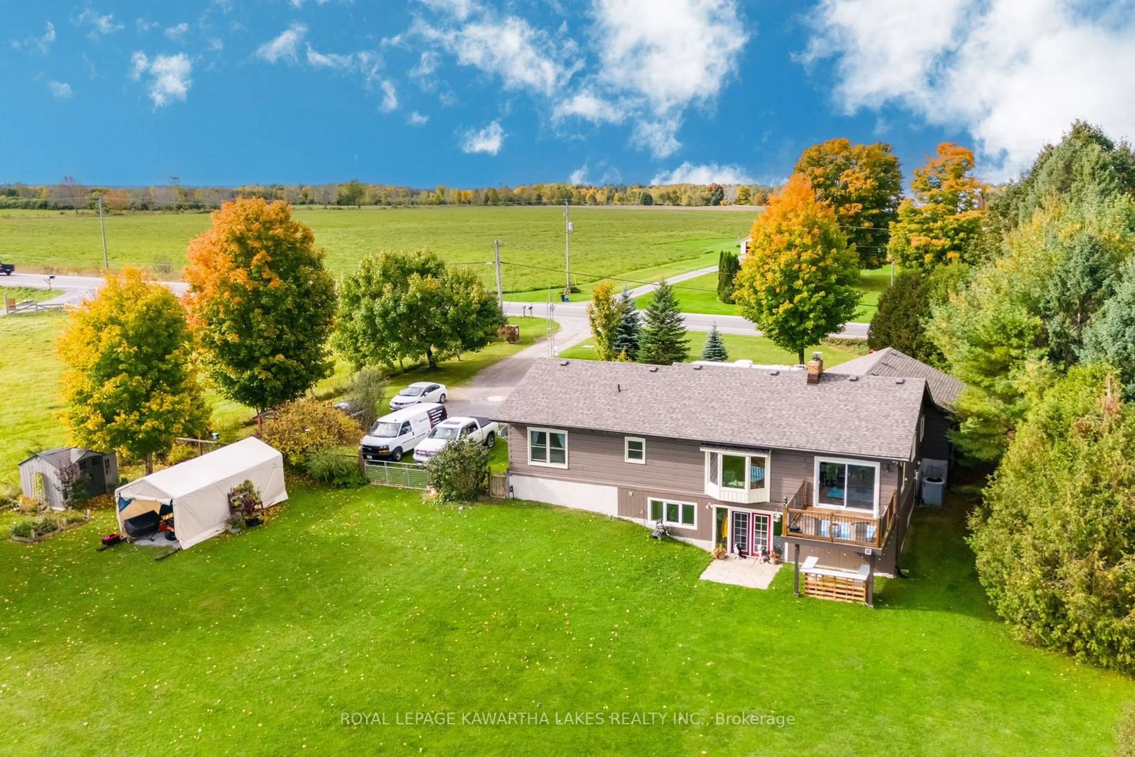 Frontside or backside of a home, the fenced backyard for 490 County Road 49, Kawartha Lakes Ontario K0M 1A0