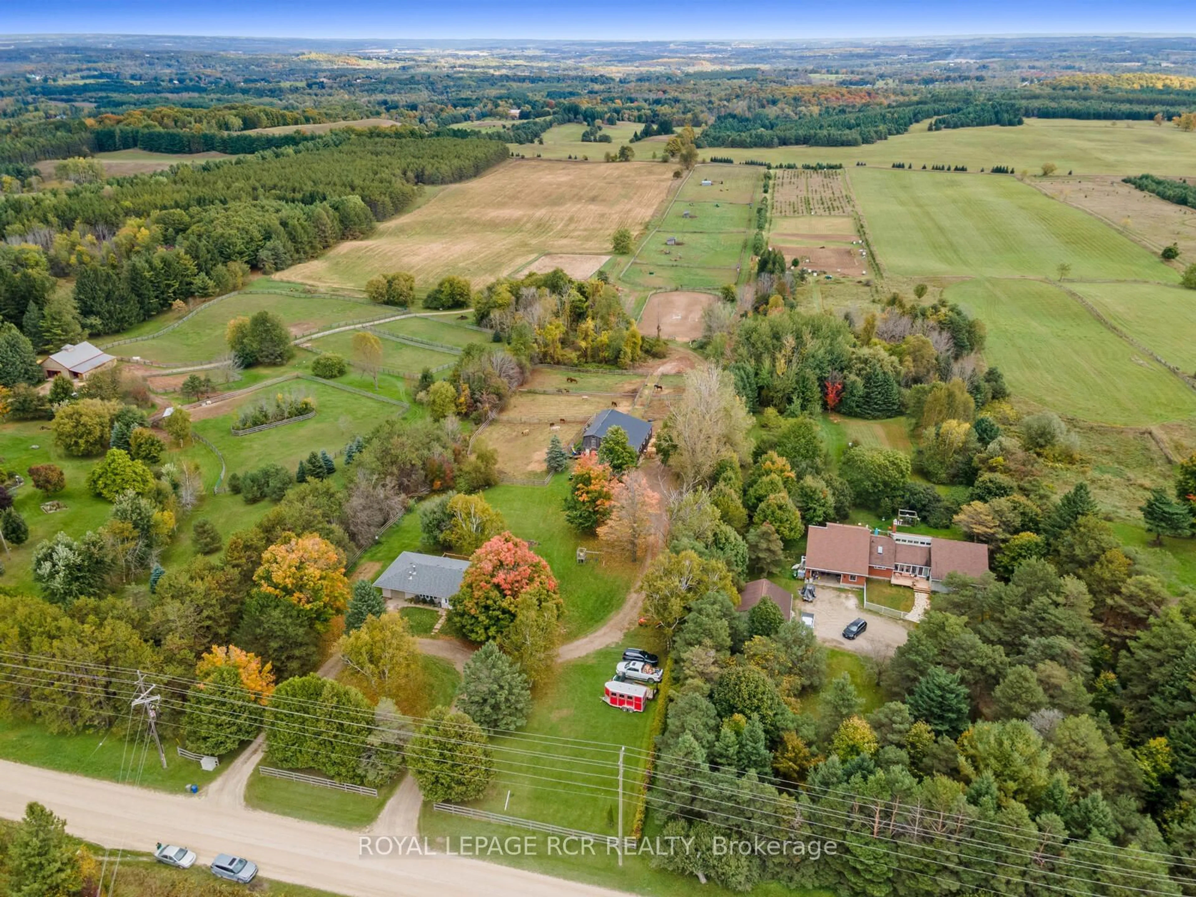 A pic from outside/outdoor area/front of a property/back of a property/a pic from drone, forest/trees view for 953371 7th Line, Mono Ontario L9W 6E8