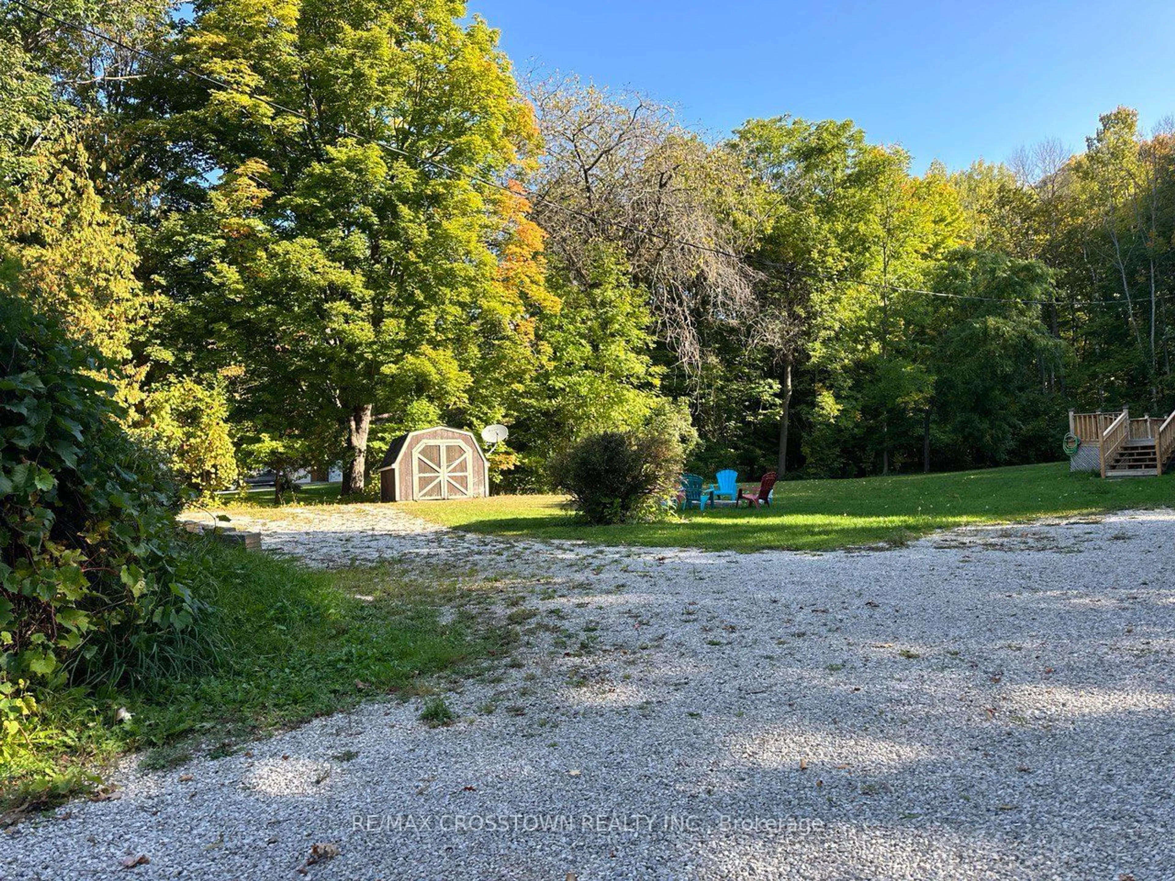 A pic from exterior of the house or condo, the fenced backyard for 144 LAKE DALRYMPLE Rd, Kawartha Lakes Ontario L0K 1W0