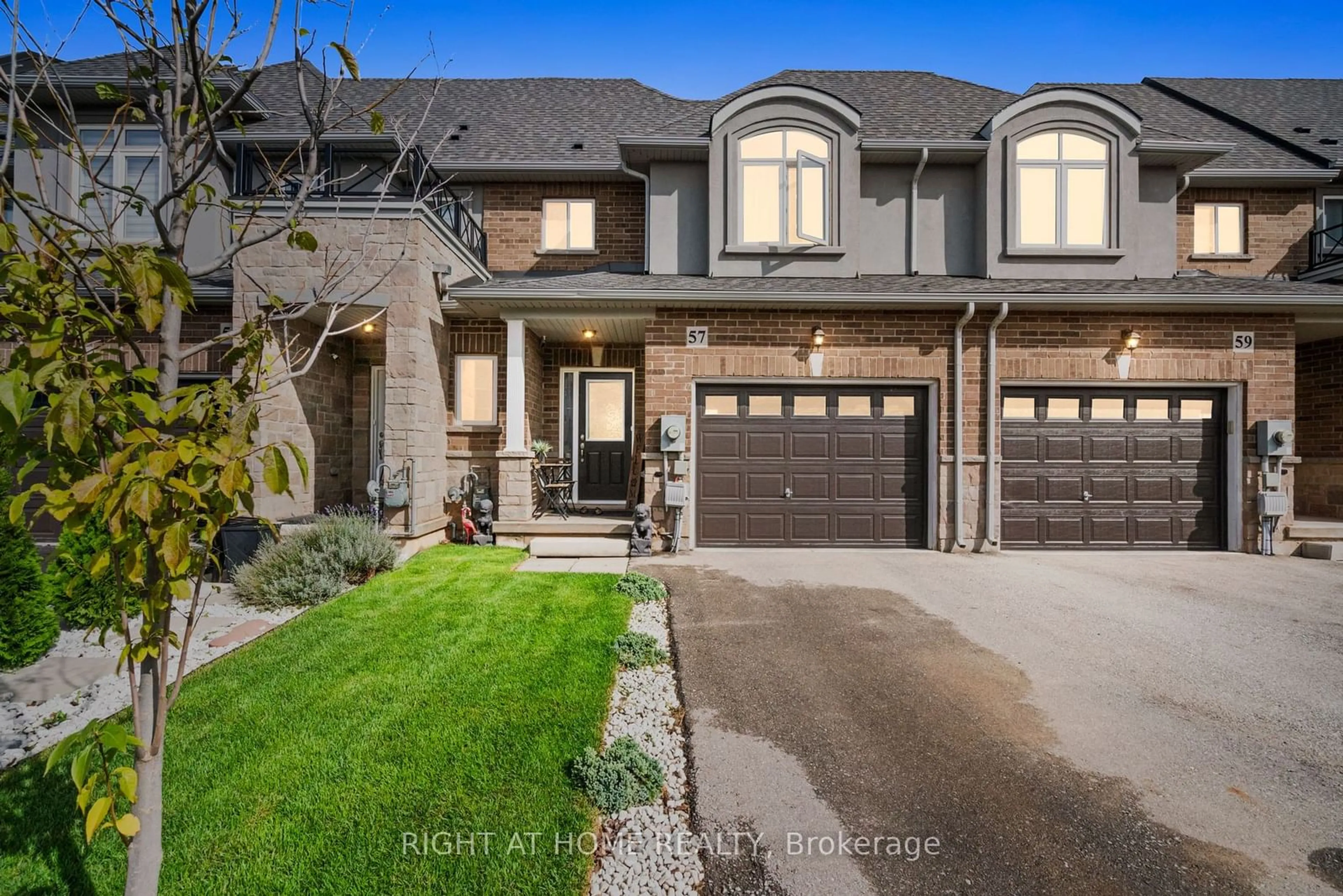 Frontside or backside of a home, the street view for 57 Pinot Cres, Hamilton Ontario L8E 0J9