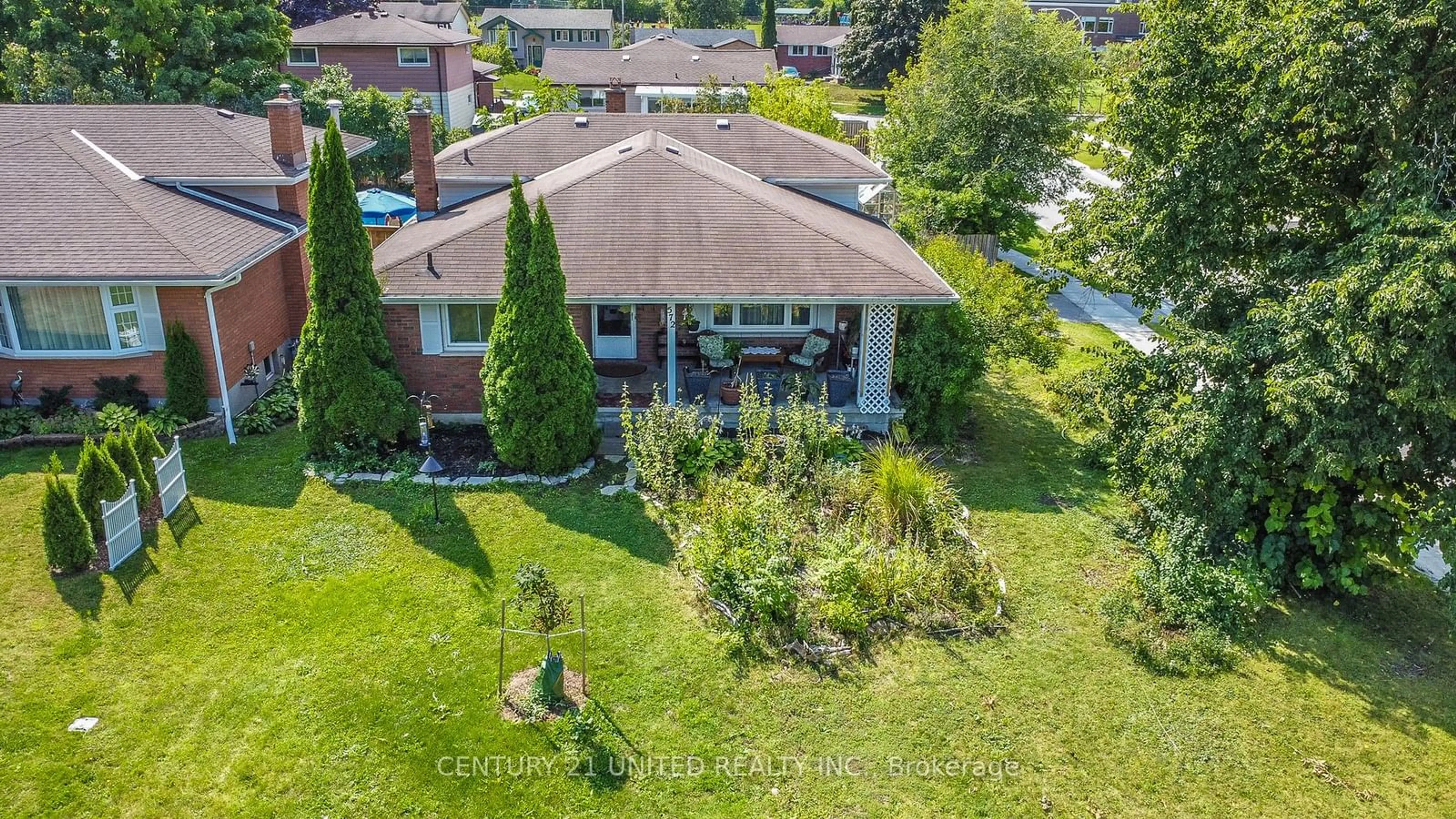 A pic from exterior of the house or condo, the fenced backyard for 572 Saugeen Cres, Peterborough Ontario K9J 1K1