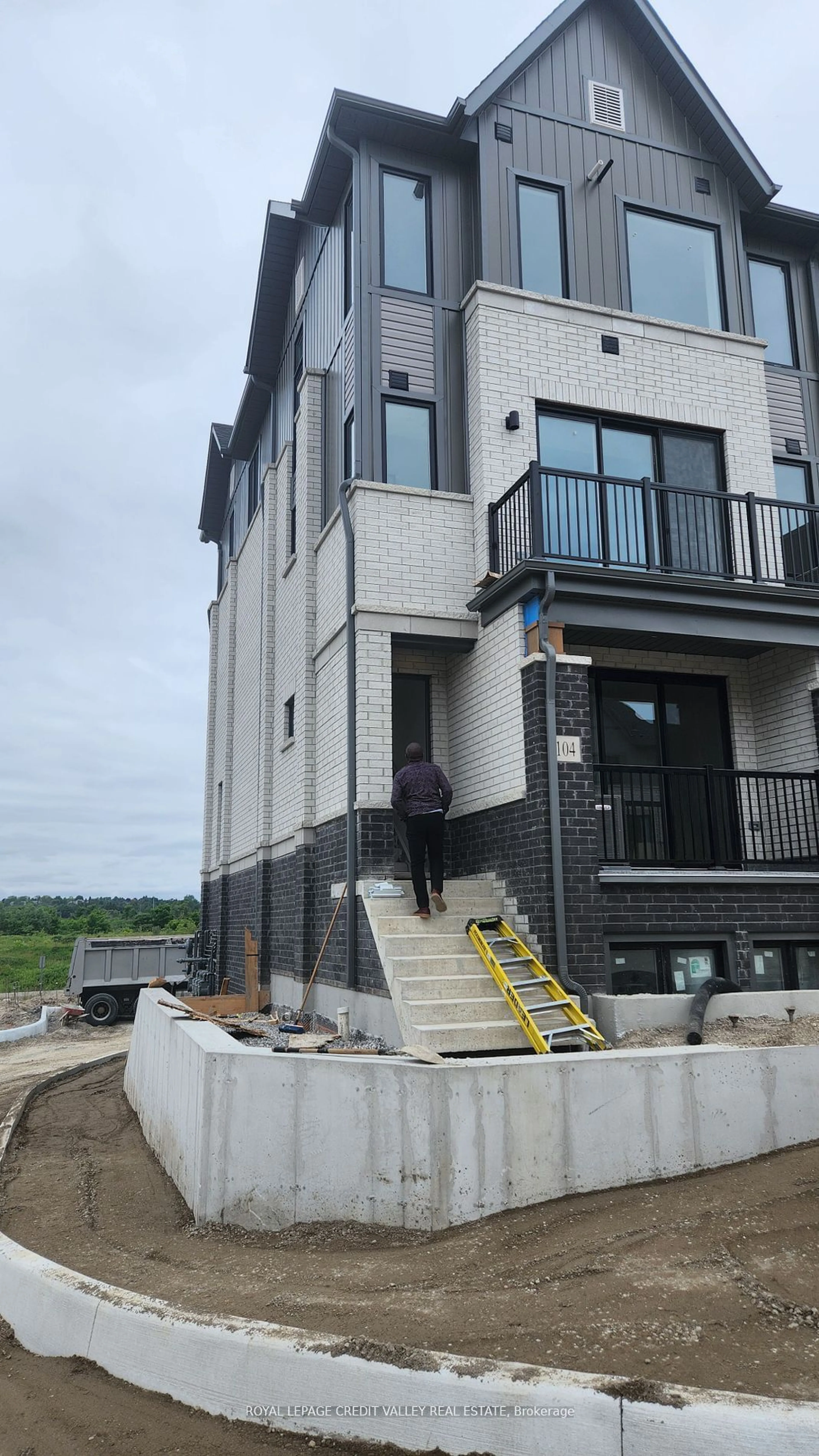 A pic from exterior of the house or condo, the front or back of building for 160 Densmore Rd #104, Cobourg Ontario K9A 4J9