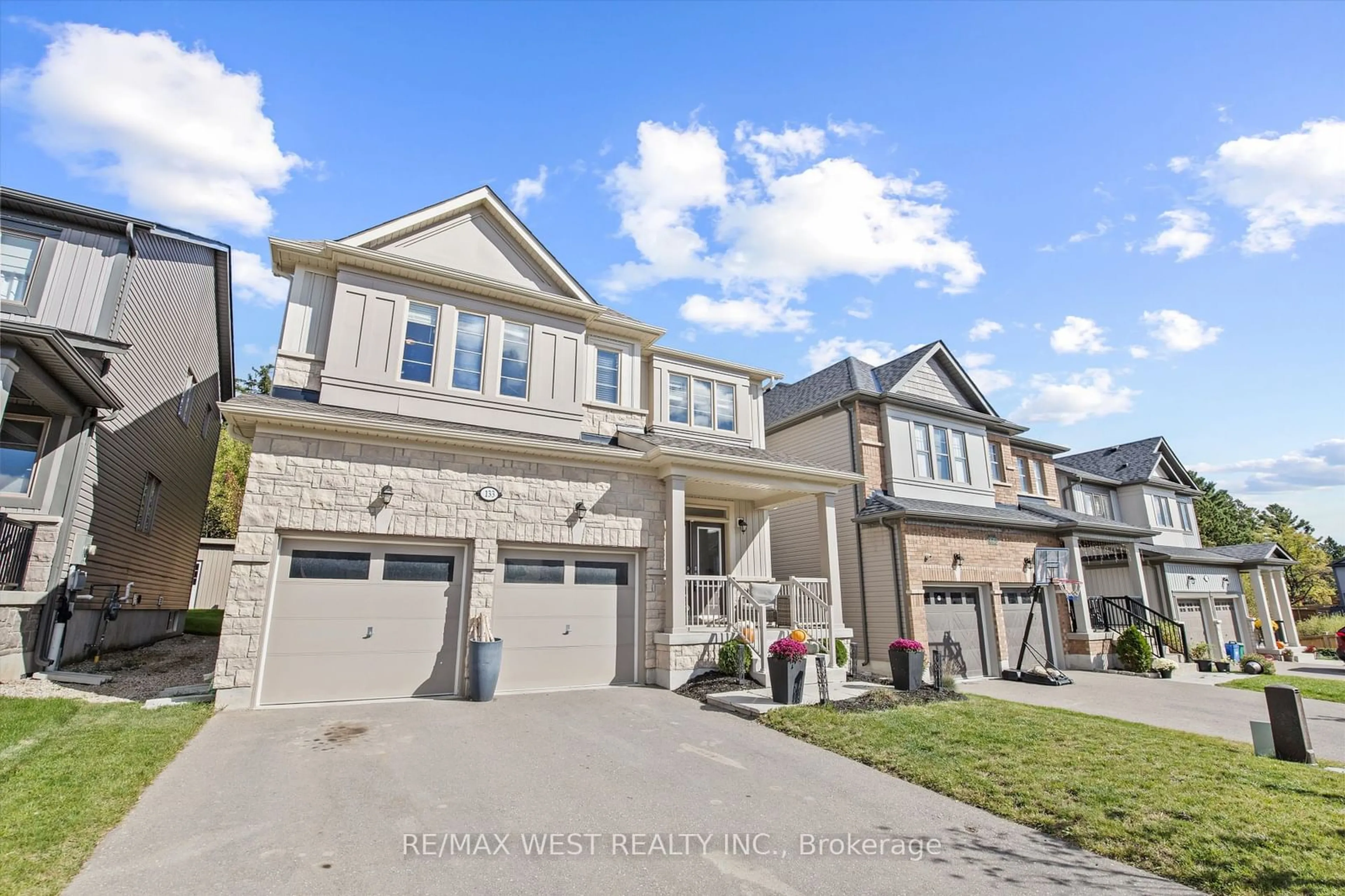 Frontside or backside of a home, the street view for 133 Mcfarlane Cres, Centre Wellington Ontario N2M 0G5