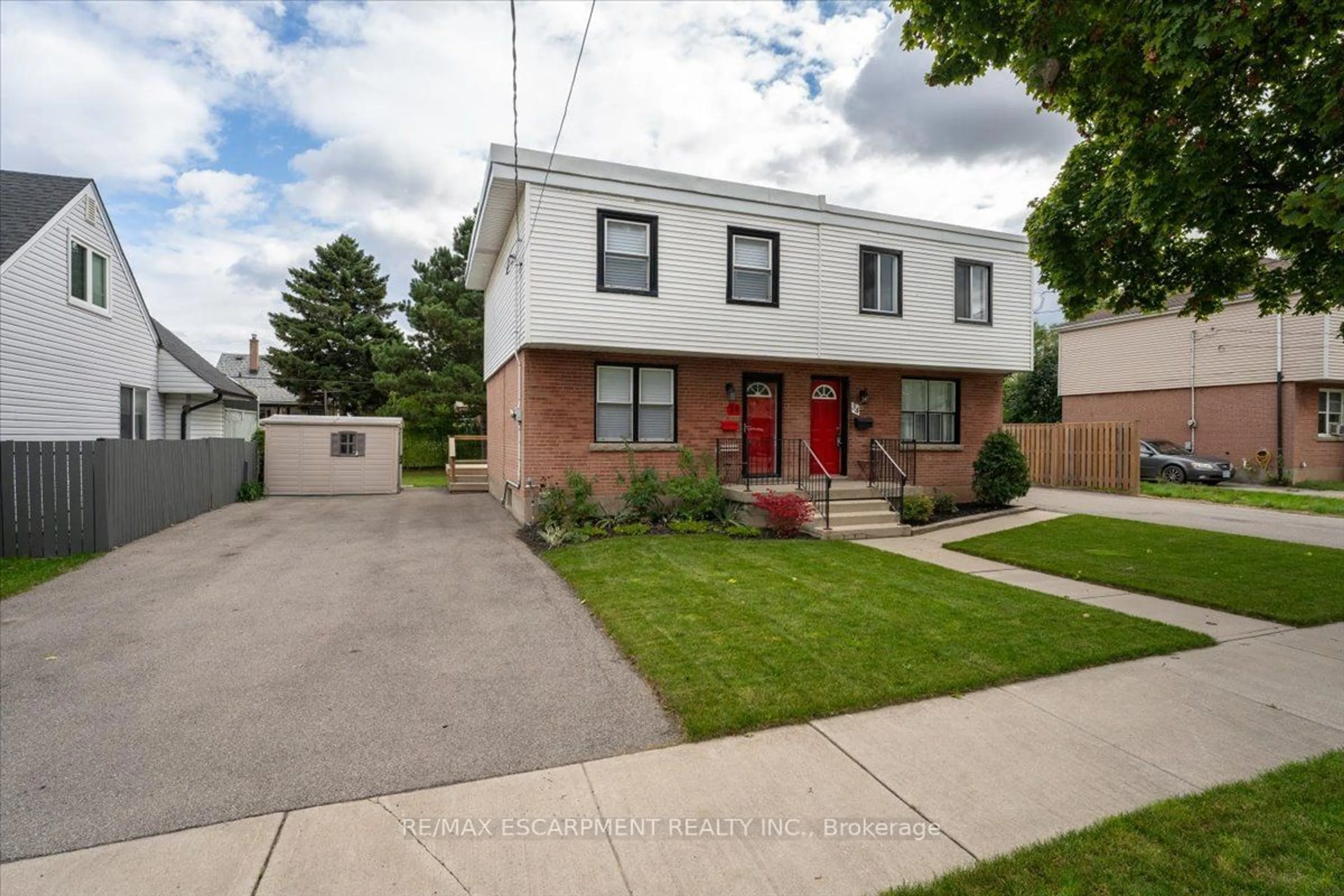 Home with brick exterior material for 36 Sumach St, Hamilton Ontario L8H 6P8