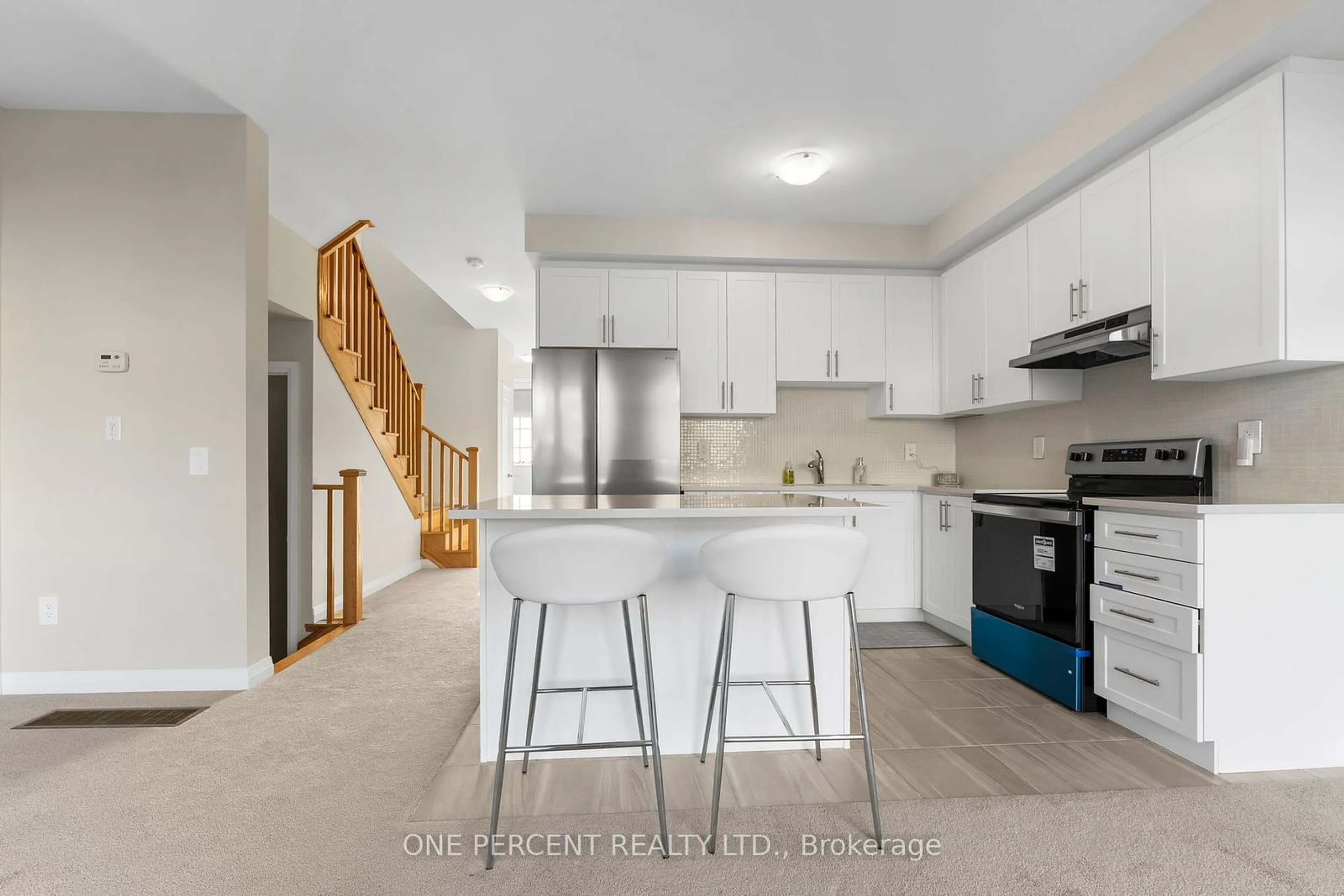 Open concept kitchen for 32 Keenan St, Kawartha Lakes Ontario K9V 6C2