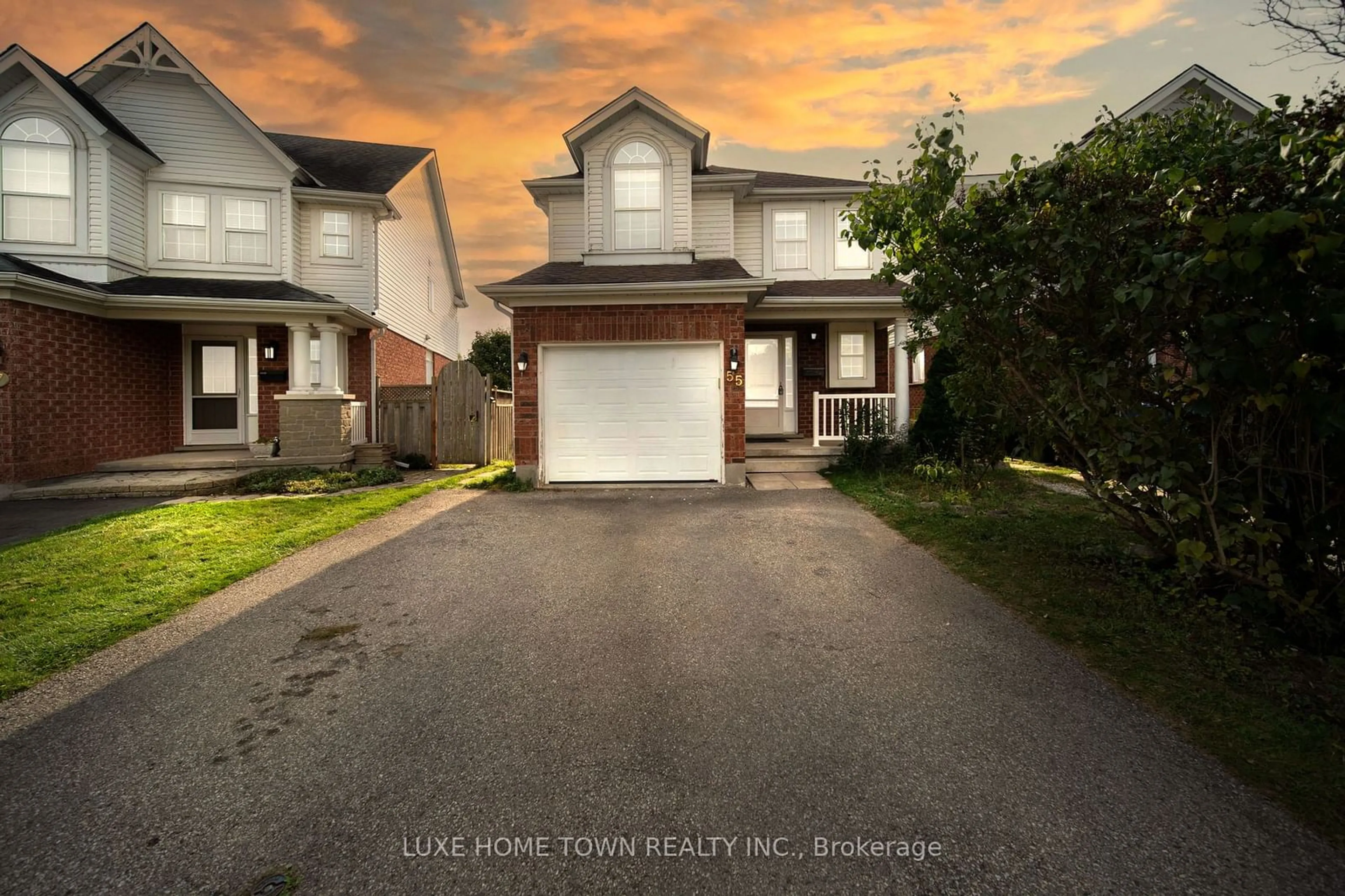 Frontside or backside of a home, the street view for 55 Southcreek Tr, Guelph Ontario N1G 4Y9