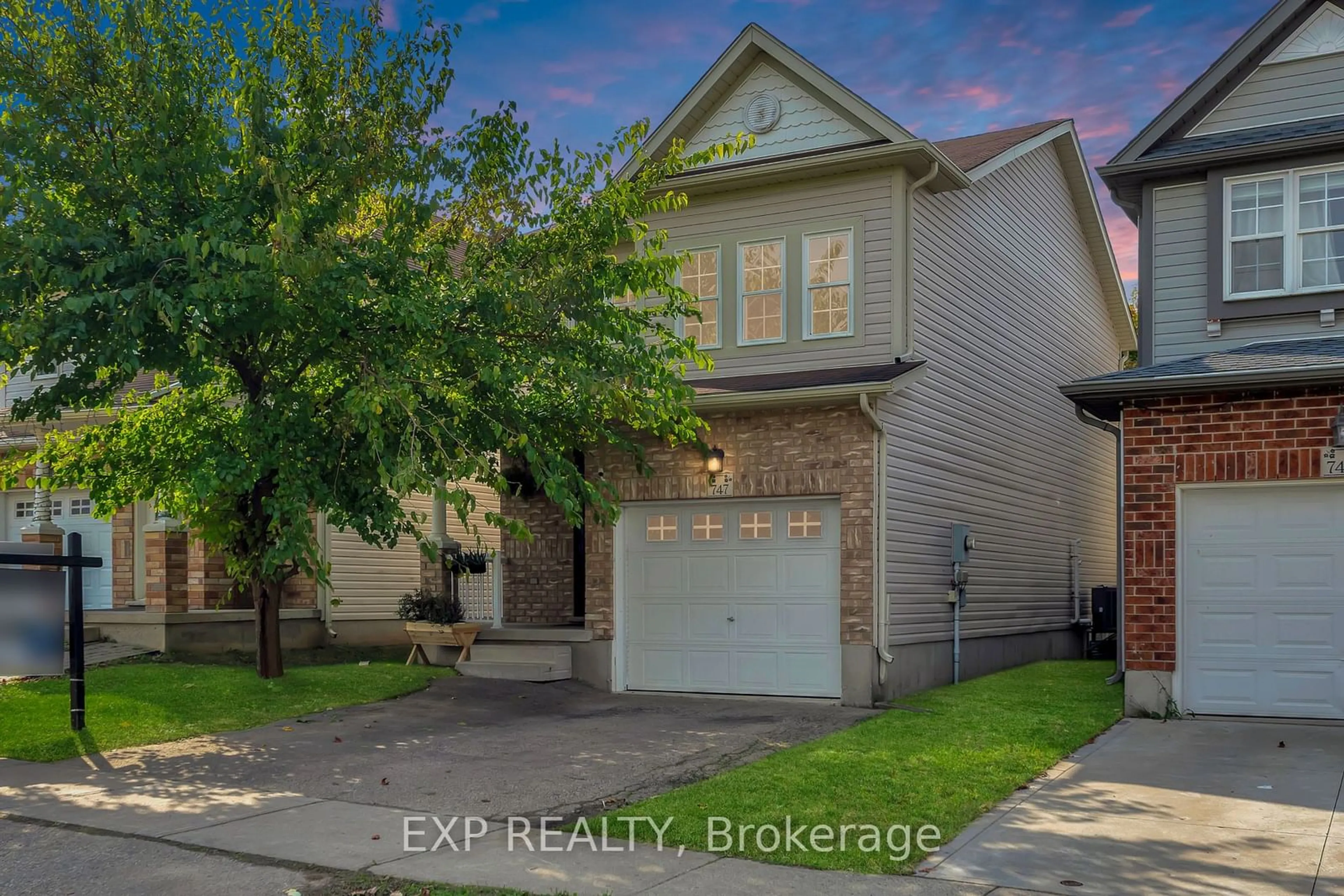 Frontside or backside of a home, the street view for 747 Laurelwood Dr, Waterloo Ontario N2V 2T9