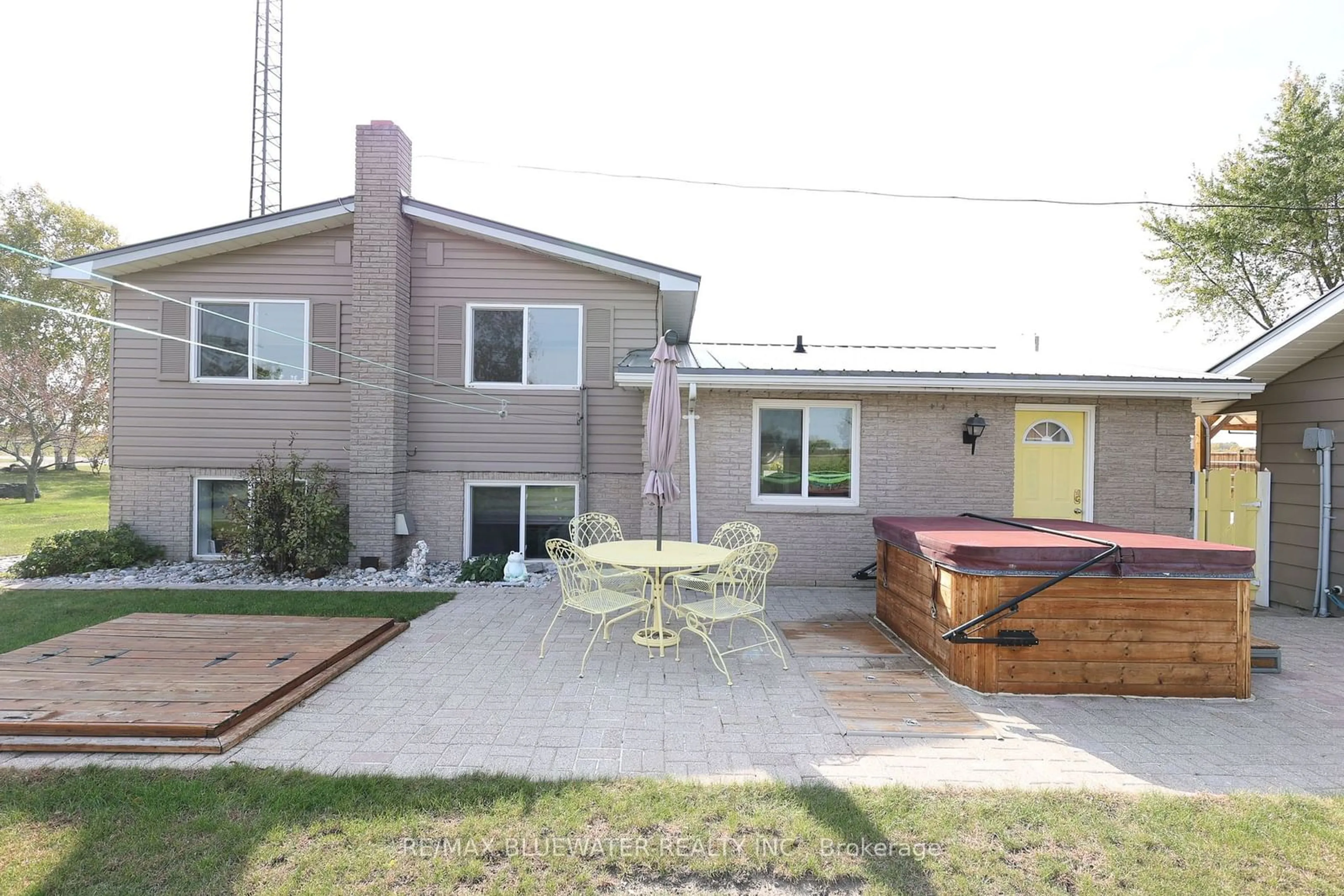 Frontside or backside of a home, the fenced backyard for 34486 Gore Rd, South Huron Ontario N0M 1T0