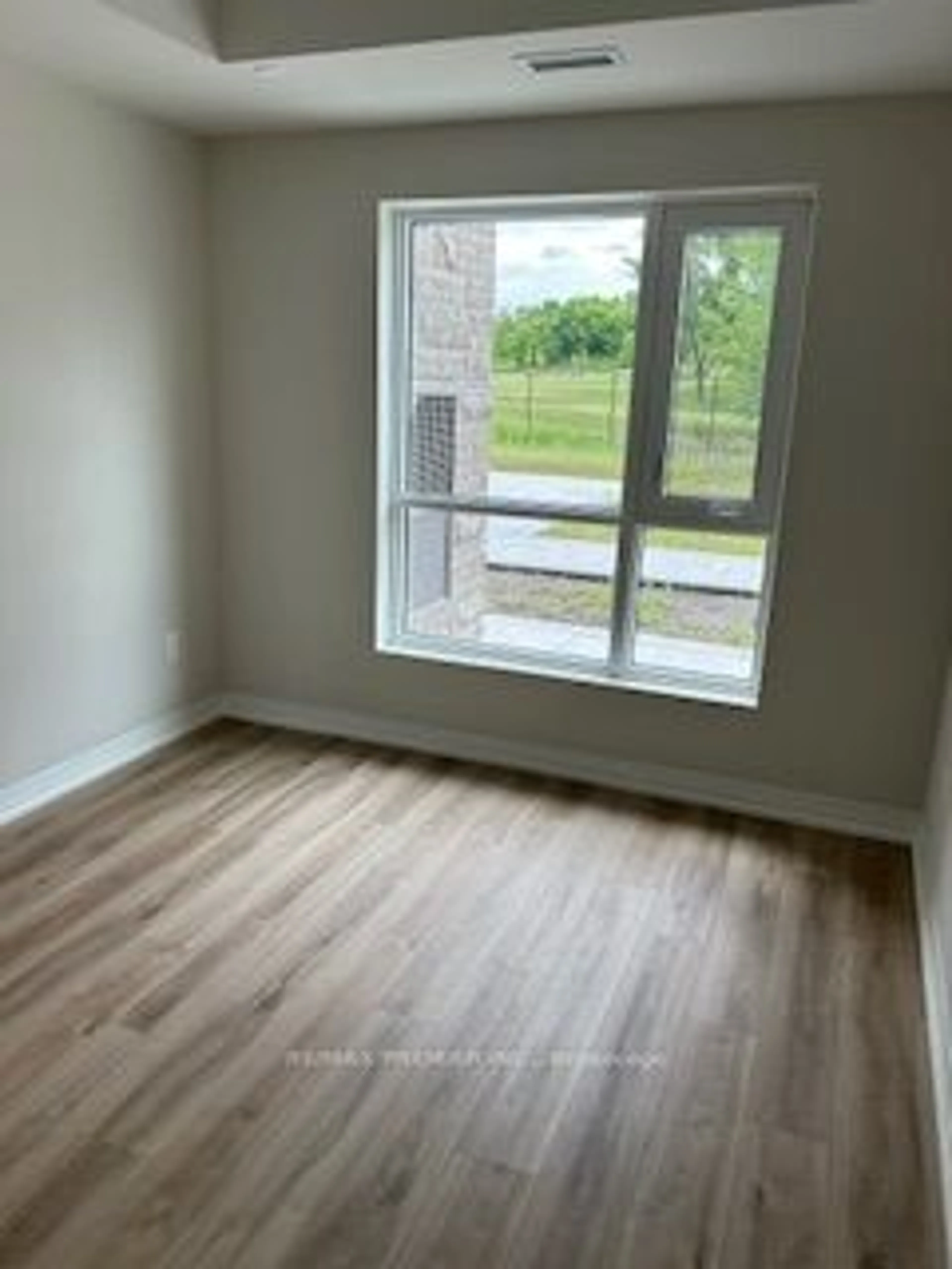 A pic of a room, wood floors for 50 Herrick Ave #GL 03, St. Catharines Ontario L2P 0G3