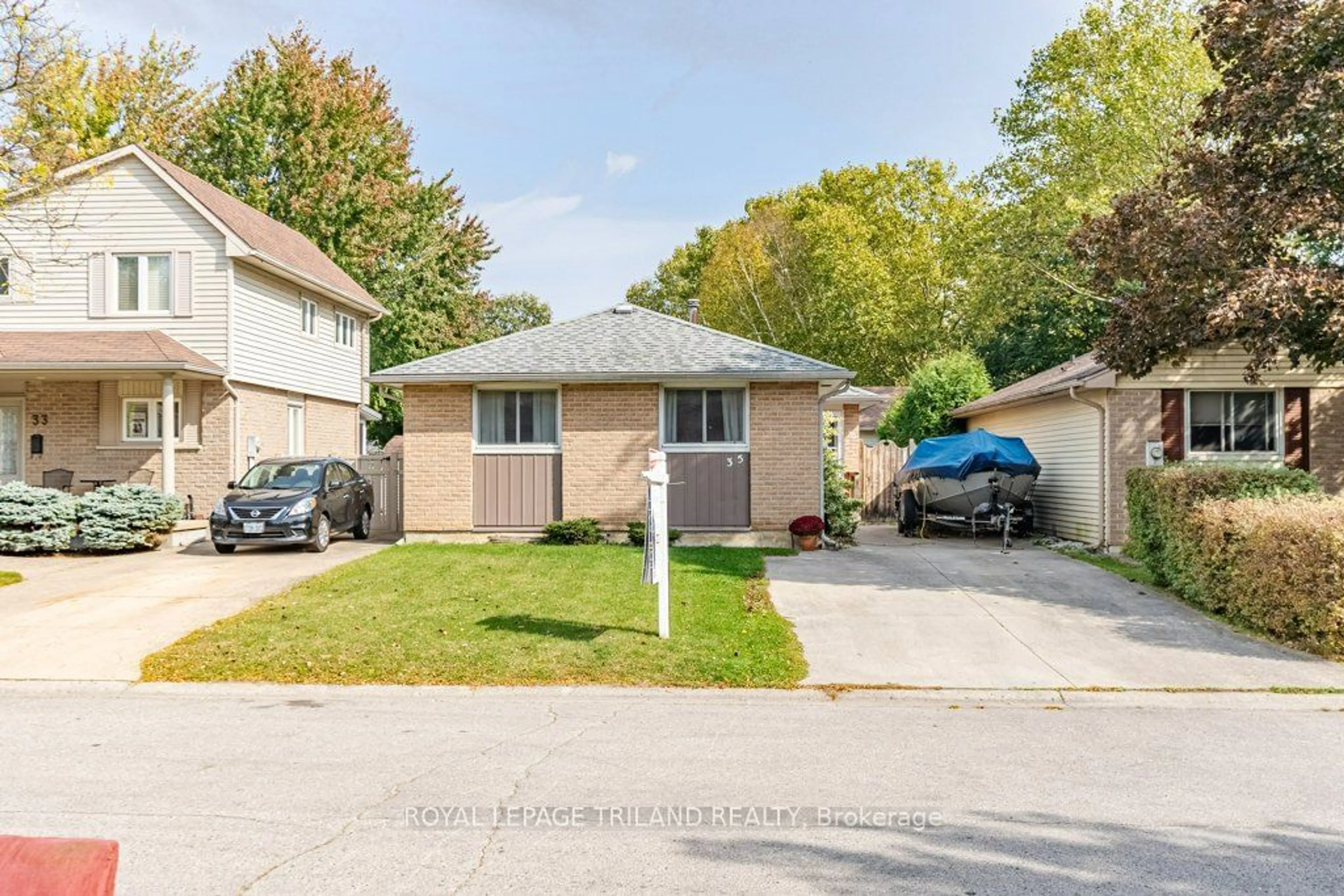 Frontside or backside of a home, the street view for 35 Caprice Cres, London Ontario N5V 3L9