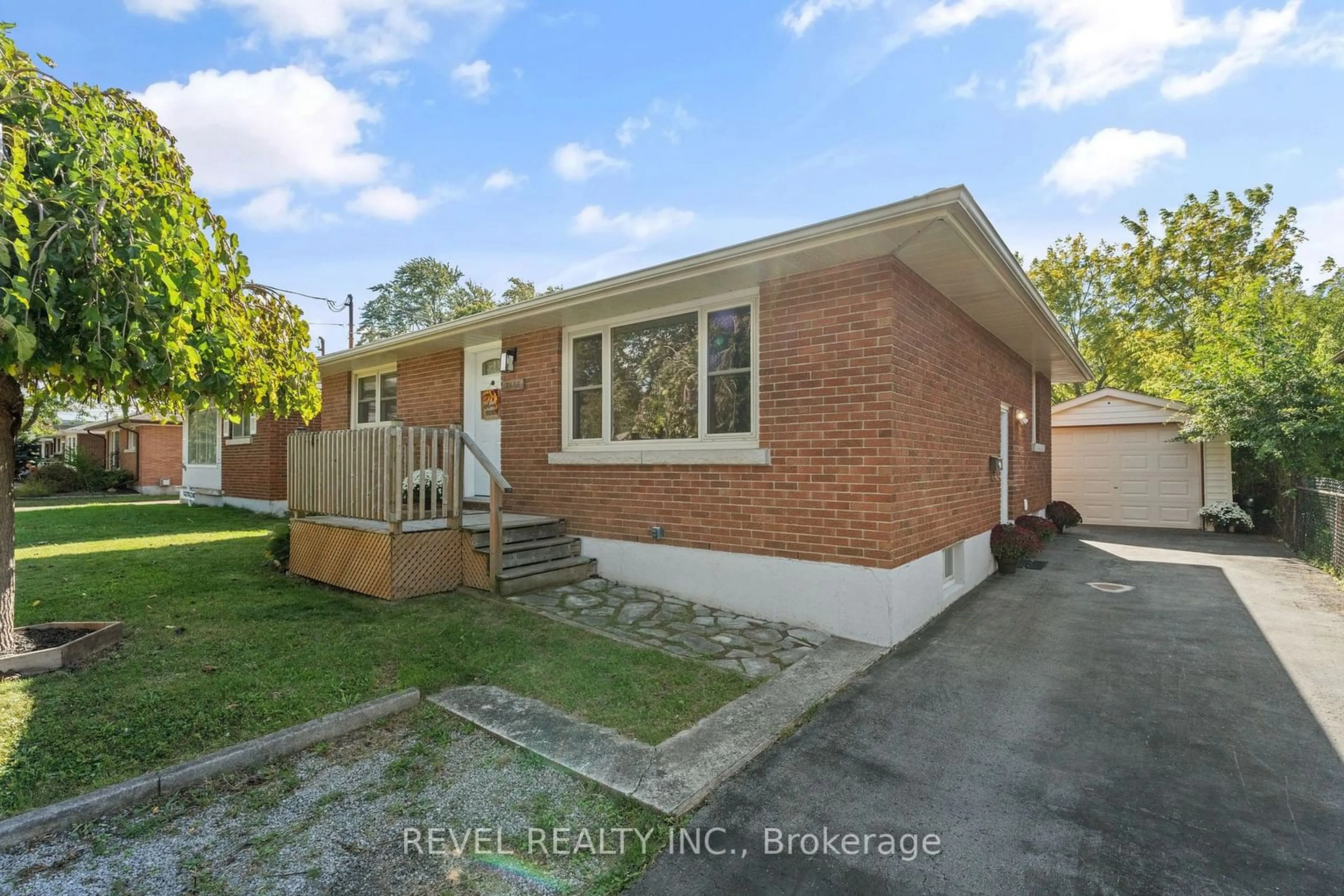 Frontside or backside of a home, the fenced backyard for 7488 Wanless St, Niagara Falls Ontario L2H 1C9