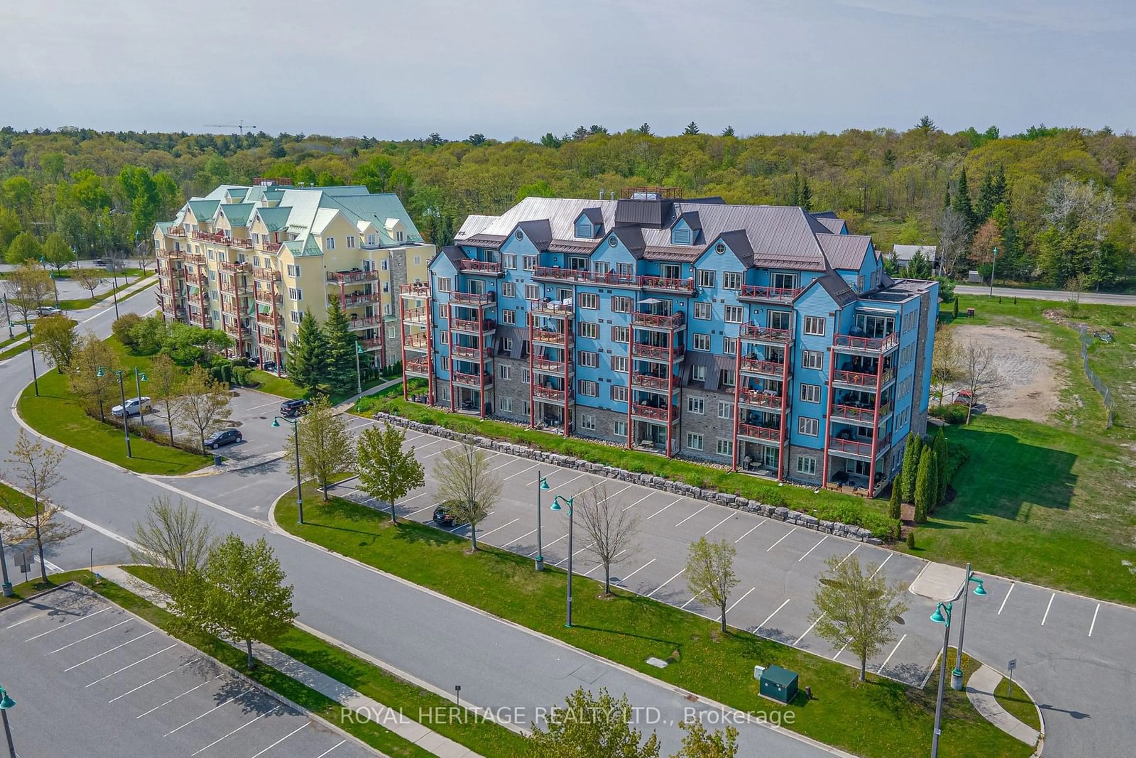 A pic from exterior of the house or condo, the street view for 130 Steamship Bay Rd #605, Gravenhurst Ontario P0C 1G0