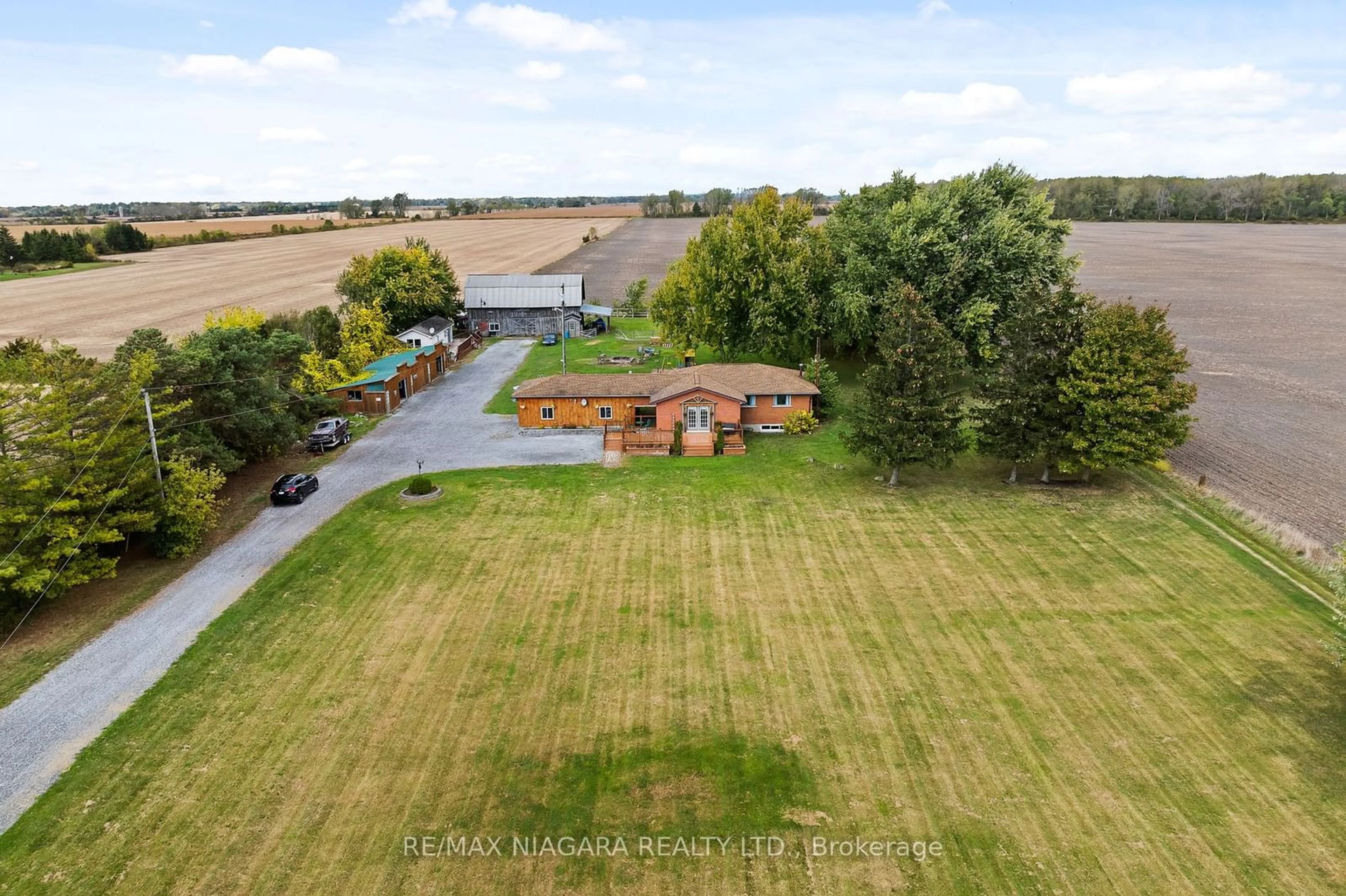 Frontside or backside of a home, the fenced backyard for 11366 Highway 3, Wainfleet Ontario L3K 5V4