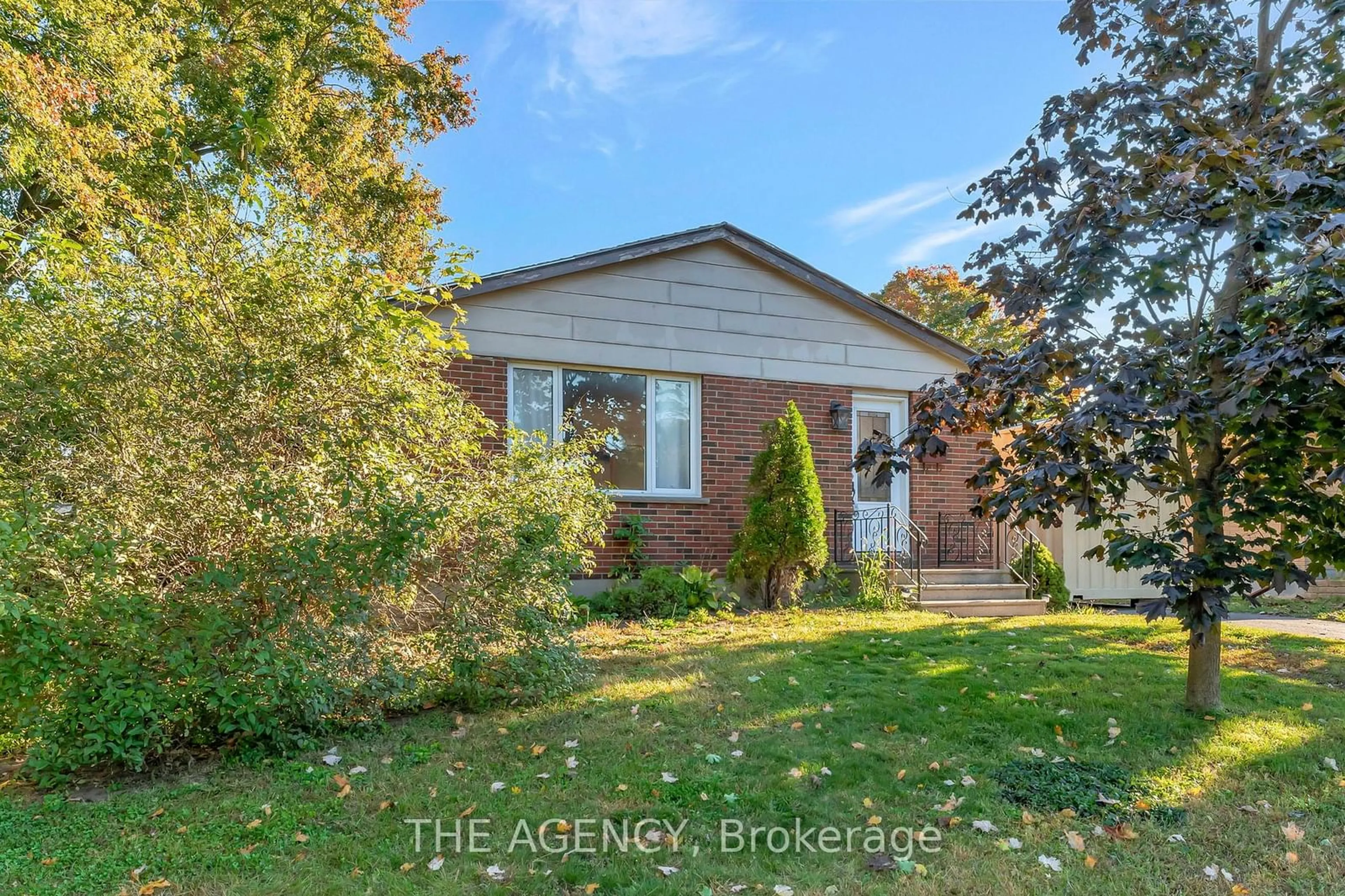 Frontside or backside of a home, the fenced backyard for 58 Devonshire Ave, Tillsonburg Ontario N4G 4K9