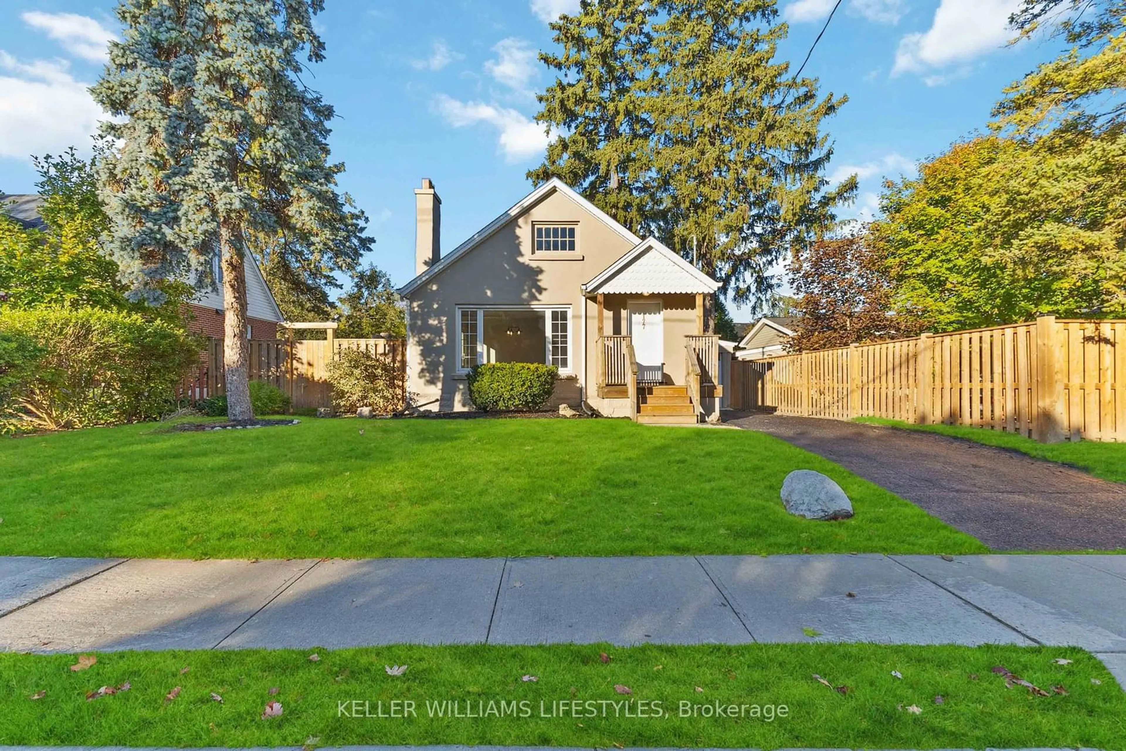 Frontside or backside of a home, the fenced backyard for 177 Cathcart St, London Ontario N6C 3M5