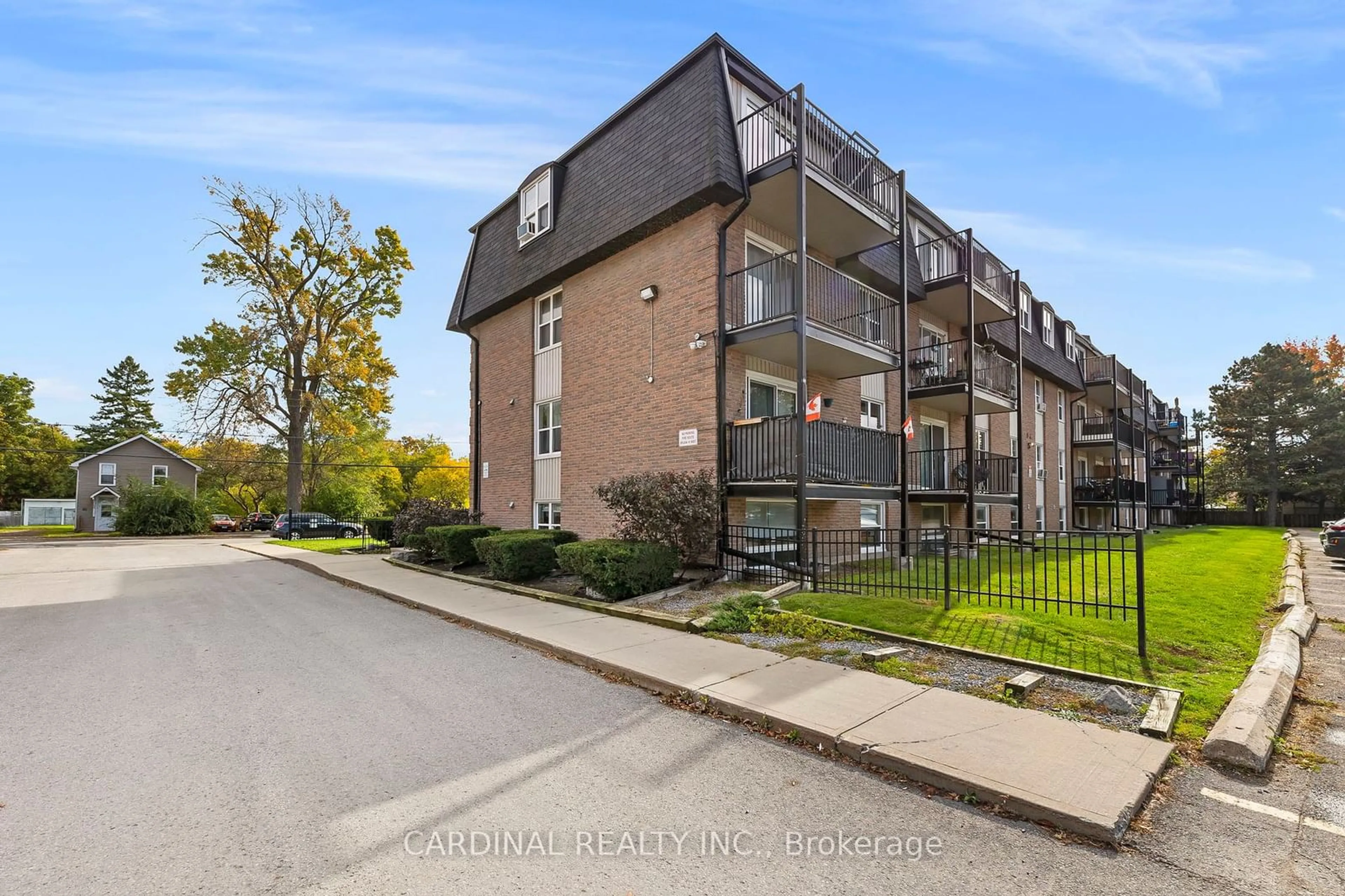 A pic from exterior of the house or condo, the fenced backyard for 80 Grier St #108, Belleville Ontario K8P 3A3