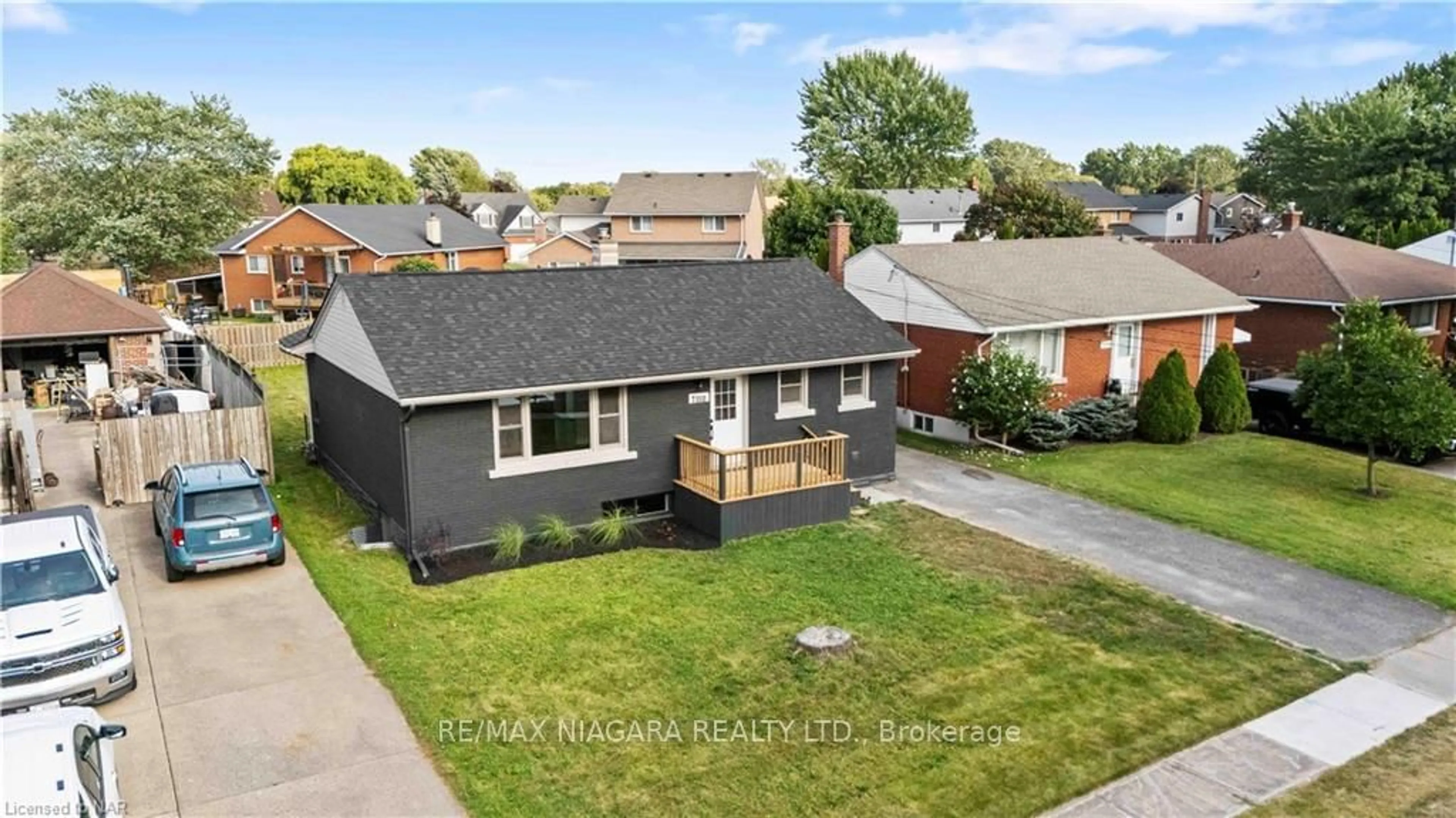 Frontside or backside of a home, the fenced backyard for 7310 Fern Ave, Niagara Falls Ontario L2G 5H2