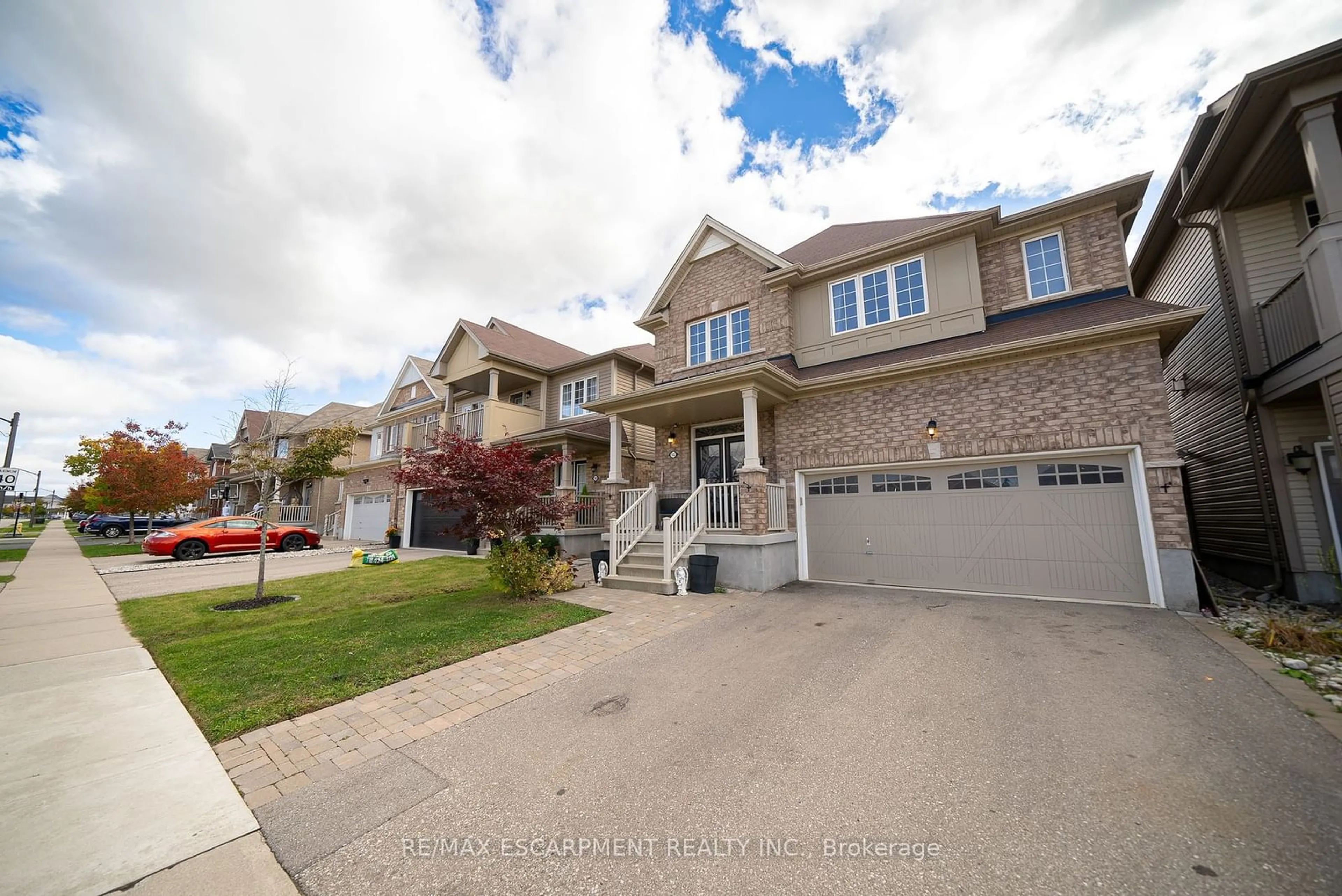 A pic from exterior of the house or condo, the street view for 102 Gillespie Dr, Brantford Ontario N3T 0K1