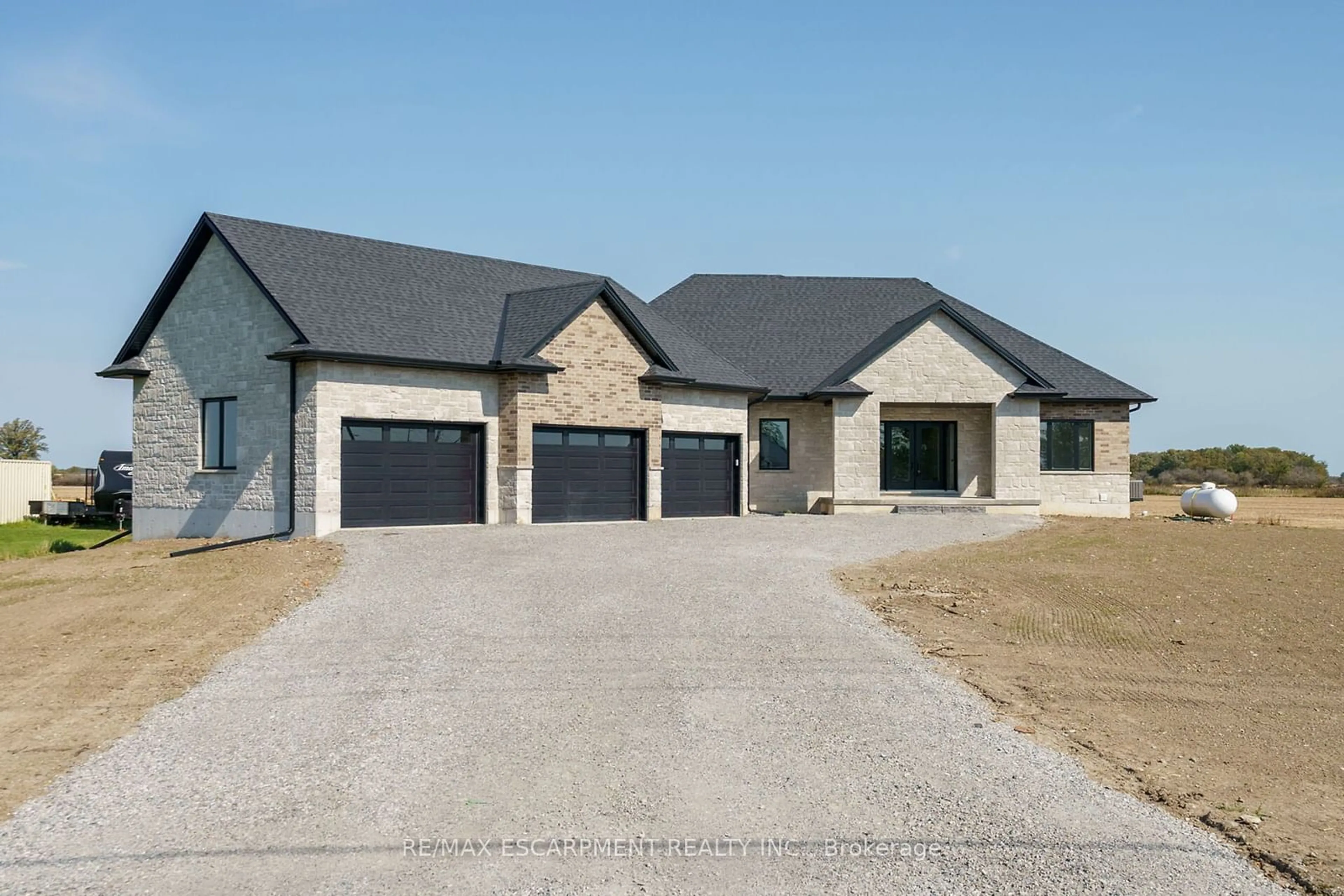 Frontside or backside of a home, the front or back of building for 535 #20 Haldimand Rd, Haldimand Ontario N0A 1H0