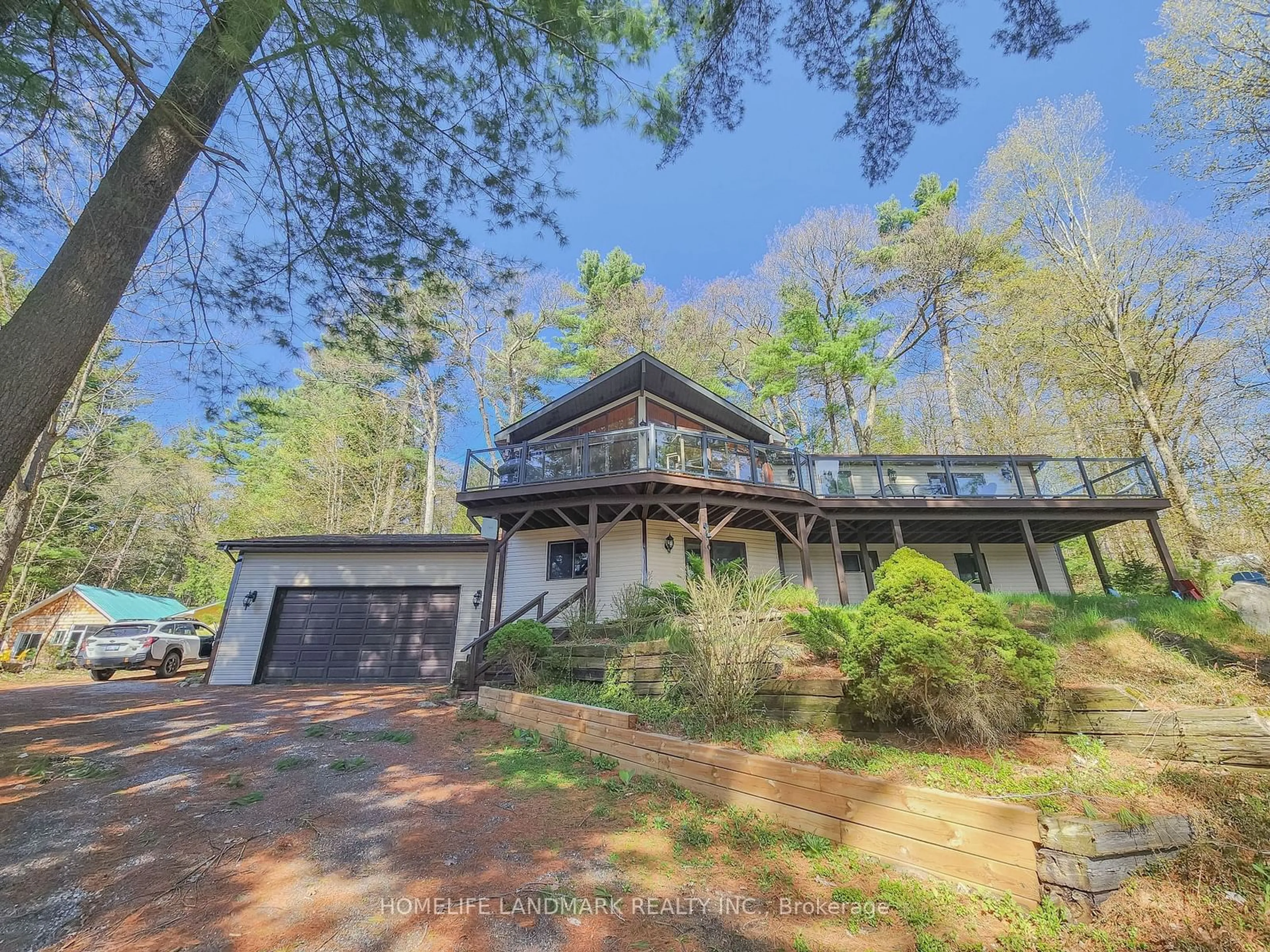 Frontside or backside of a home, cottage for 1245 Mortimers Point Rd, Muskoka Lakes Ontario P0B 1J0