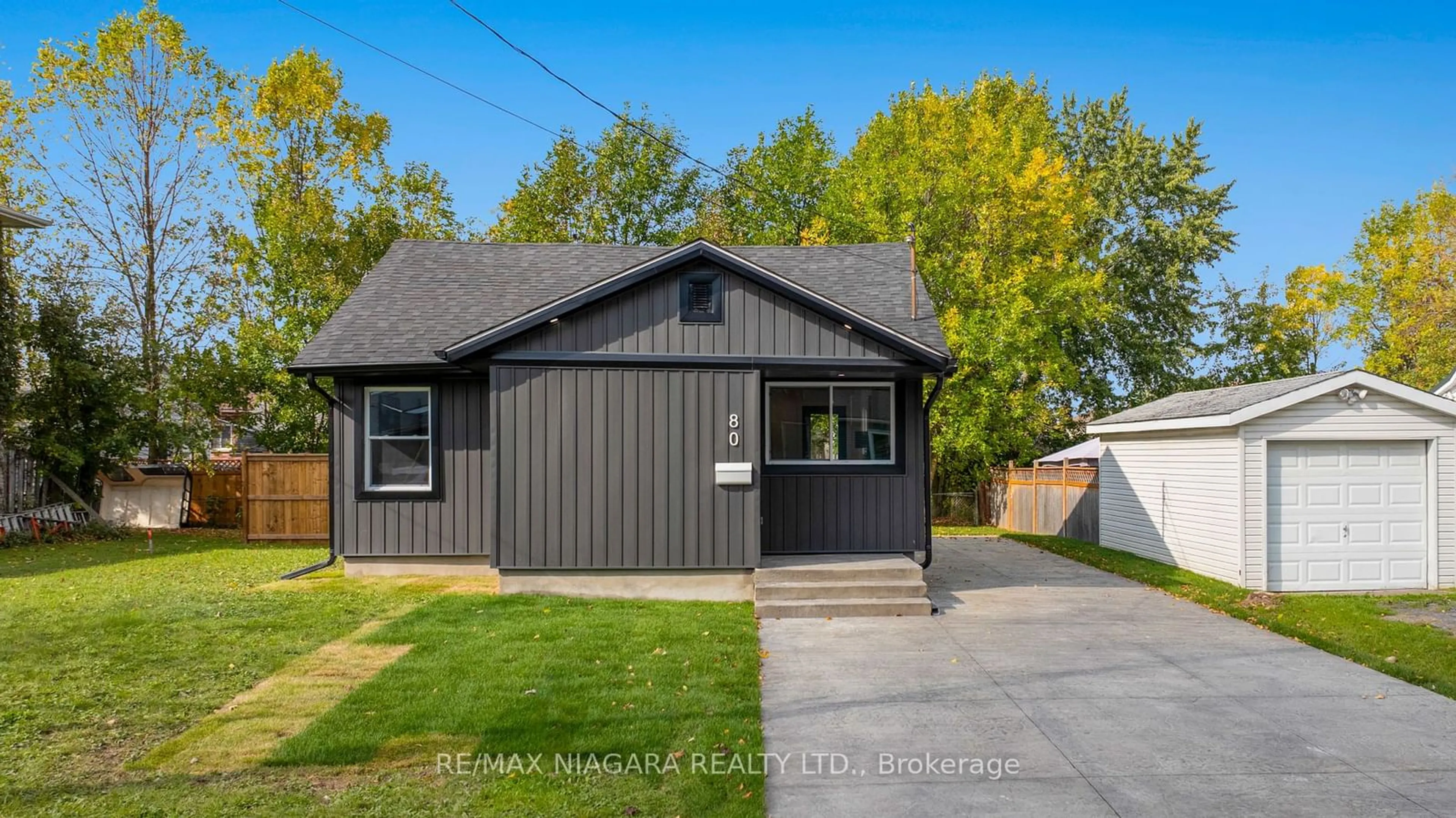 Frontside or backside of a home, the fenced backyard for 80 Ellen St, Fort Erie Ontario L2A 4E1