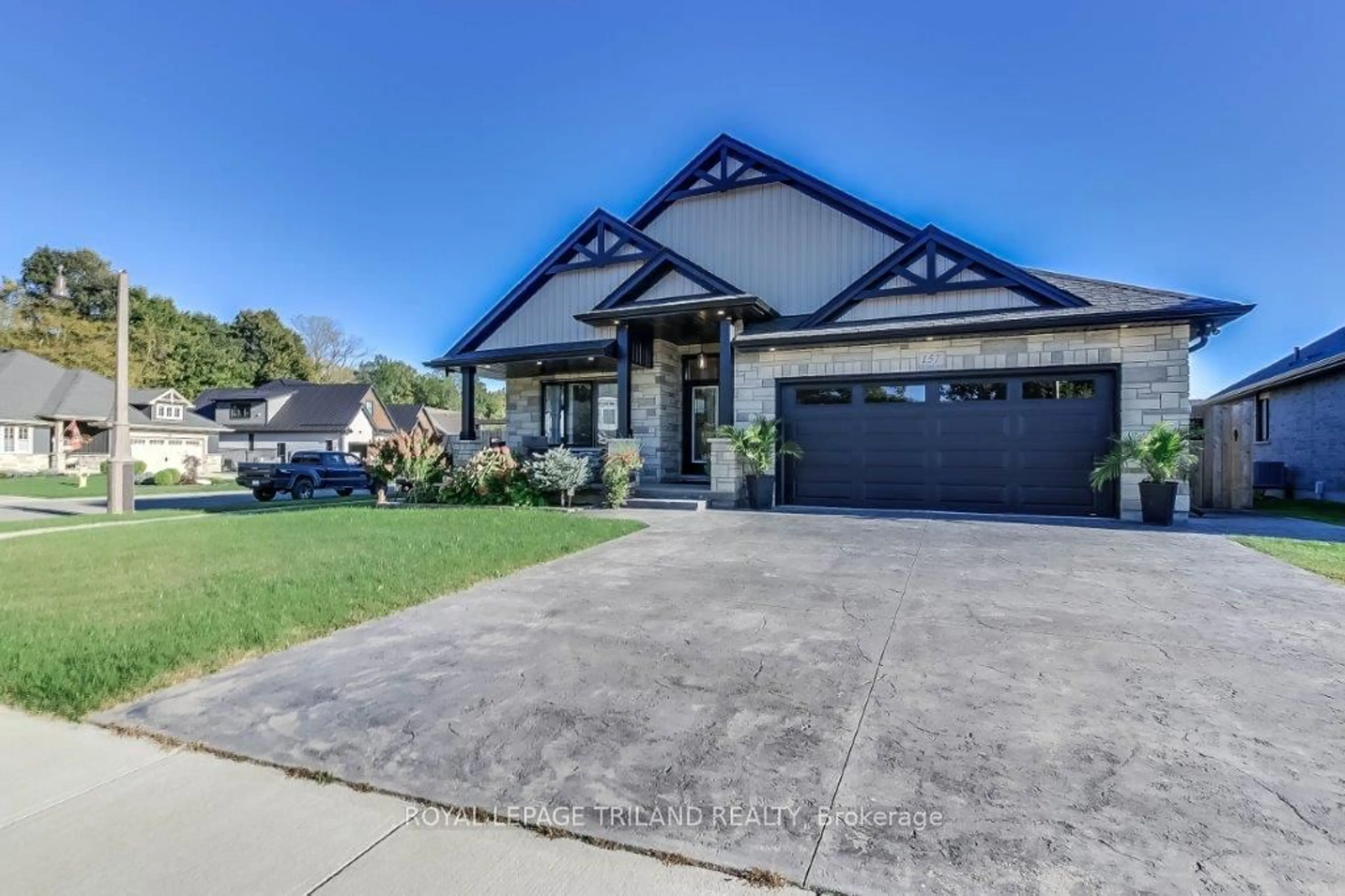 Frontside or backside of a home, the street view for 157 Old Field Lane, Central Elgin Ontario N5L 0A9