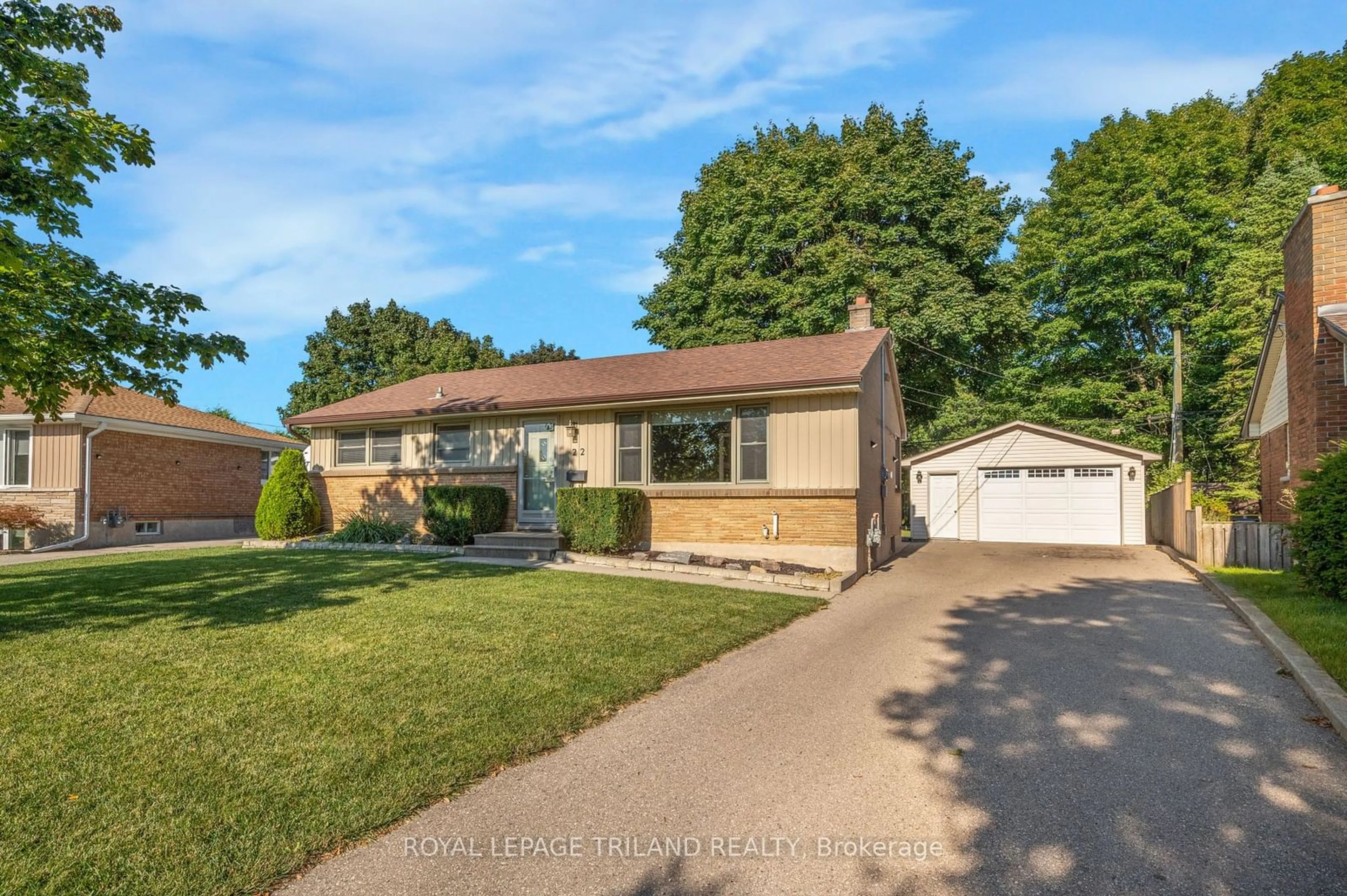 Frontside or backside of a home, the street view for 22 Breton Park Cres, London Ontario N5W 1N1