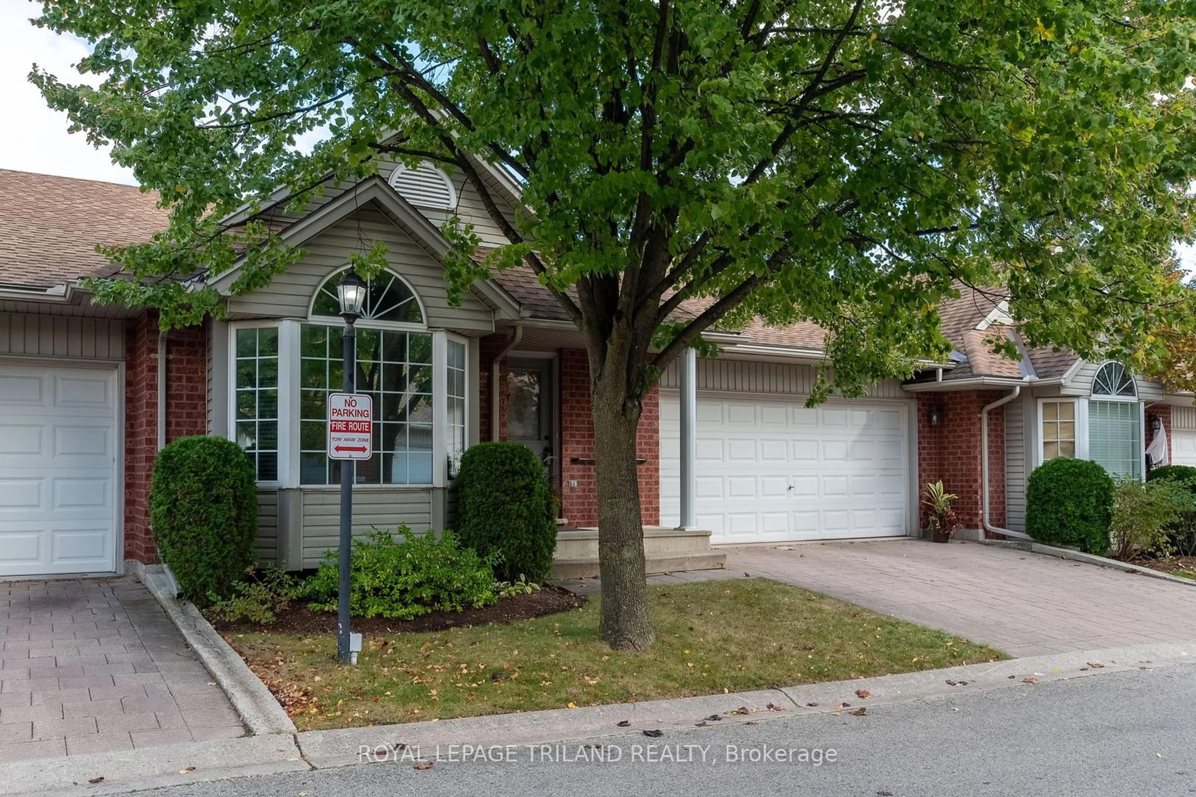 A pic from exterior of the house or condo, the street view for 122 Sherwood Forest Sq #2, London Ontario N6G 5G8