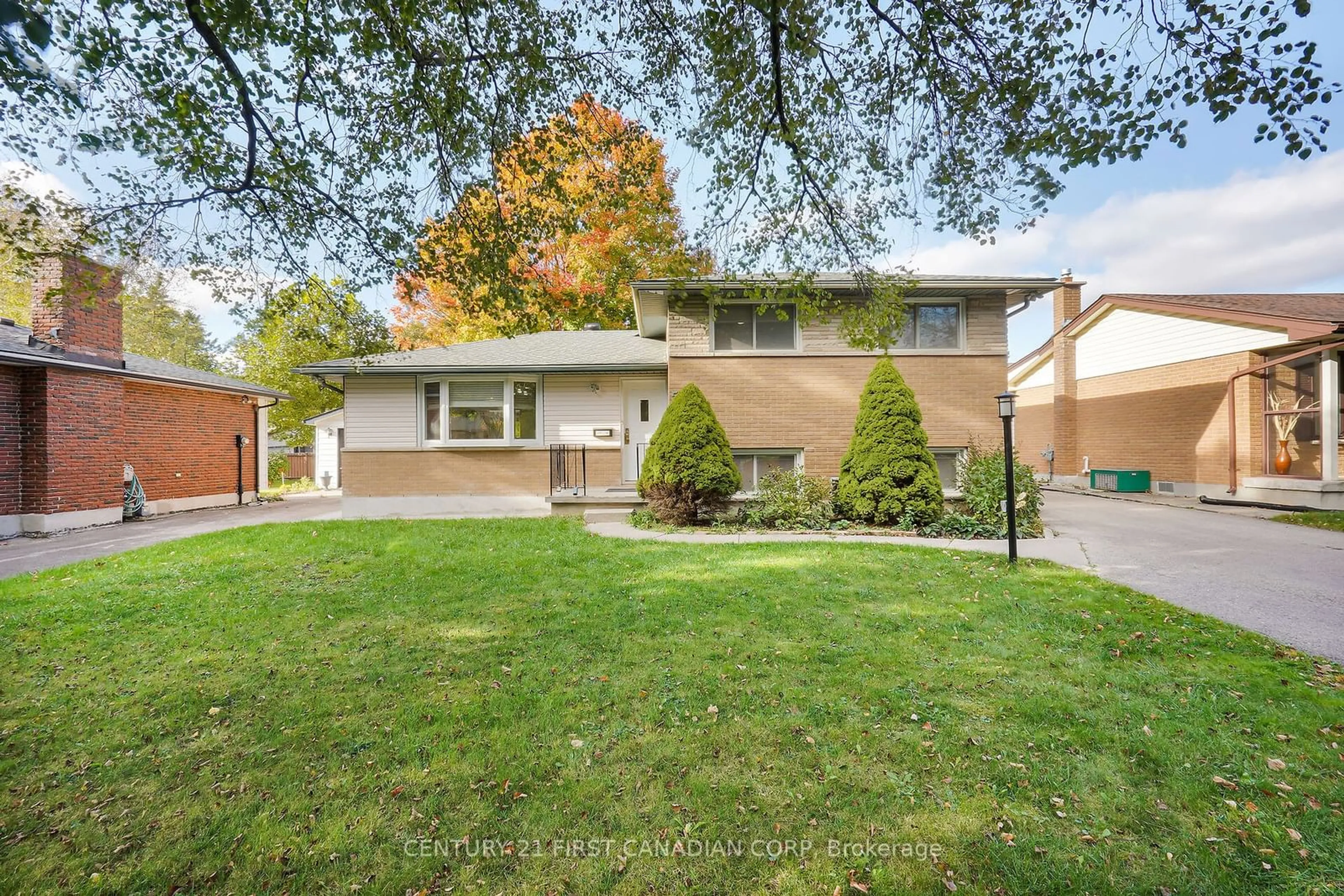 Frontside or backside of a home, the fenced backyard for 50 Amy Cres, London Ontario N5Y 4A6