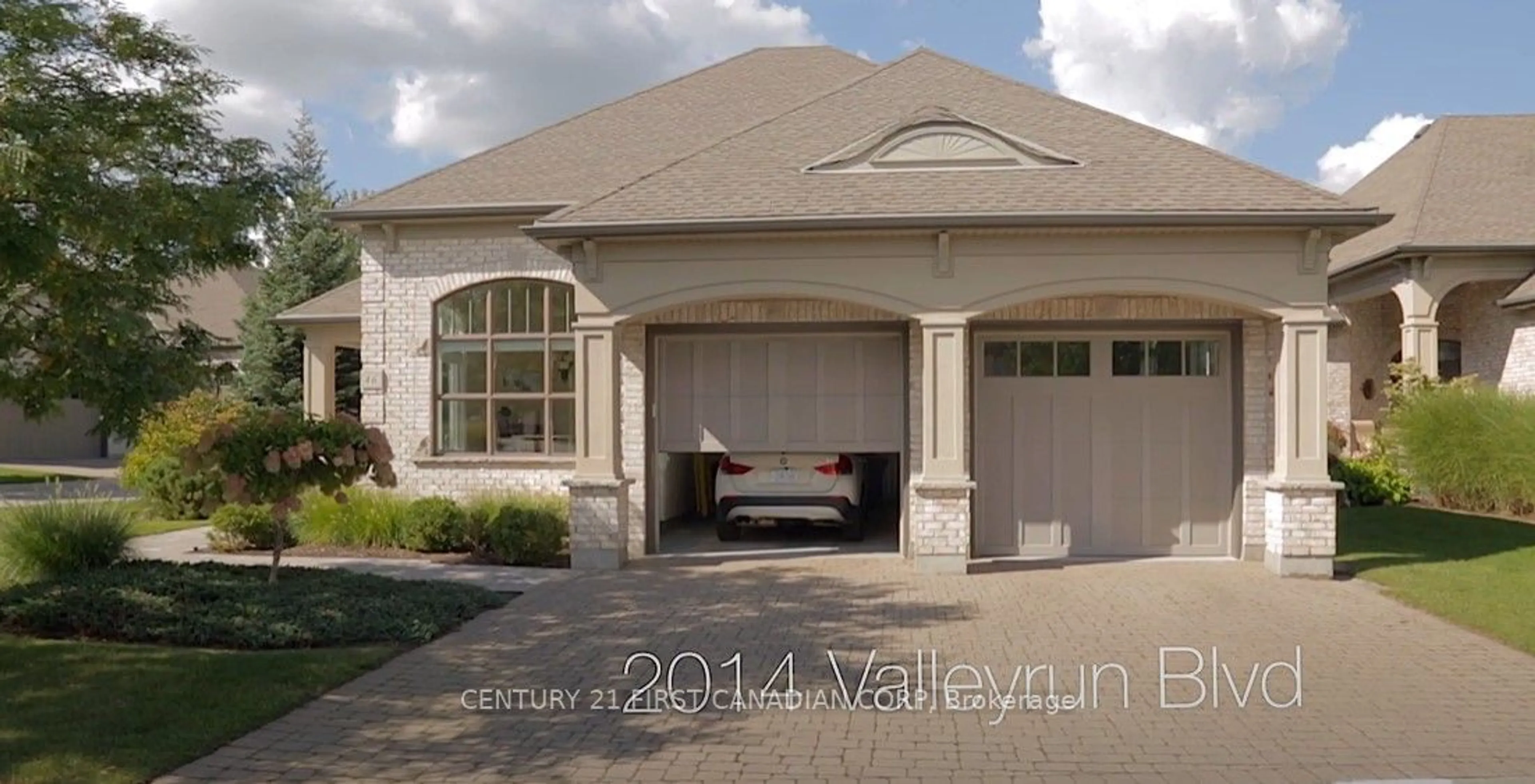 Frontside or backside of a home, the street view for 2014 Valleyrun Blvd #46, London Ontario N6G 5N8