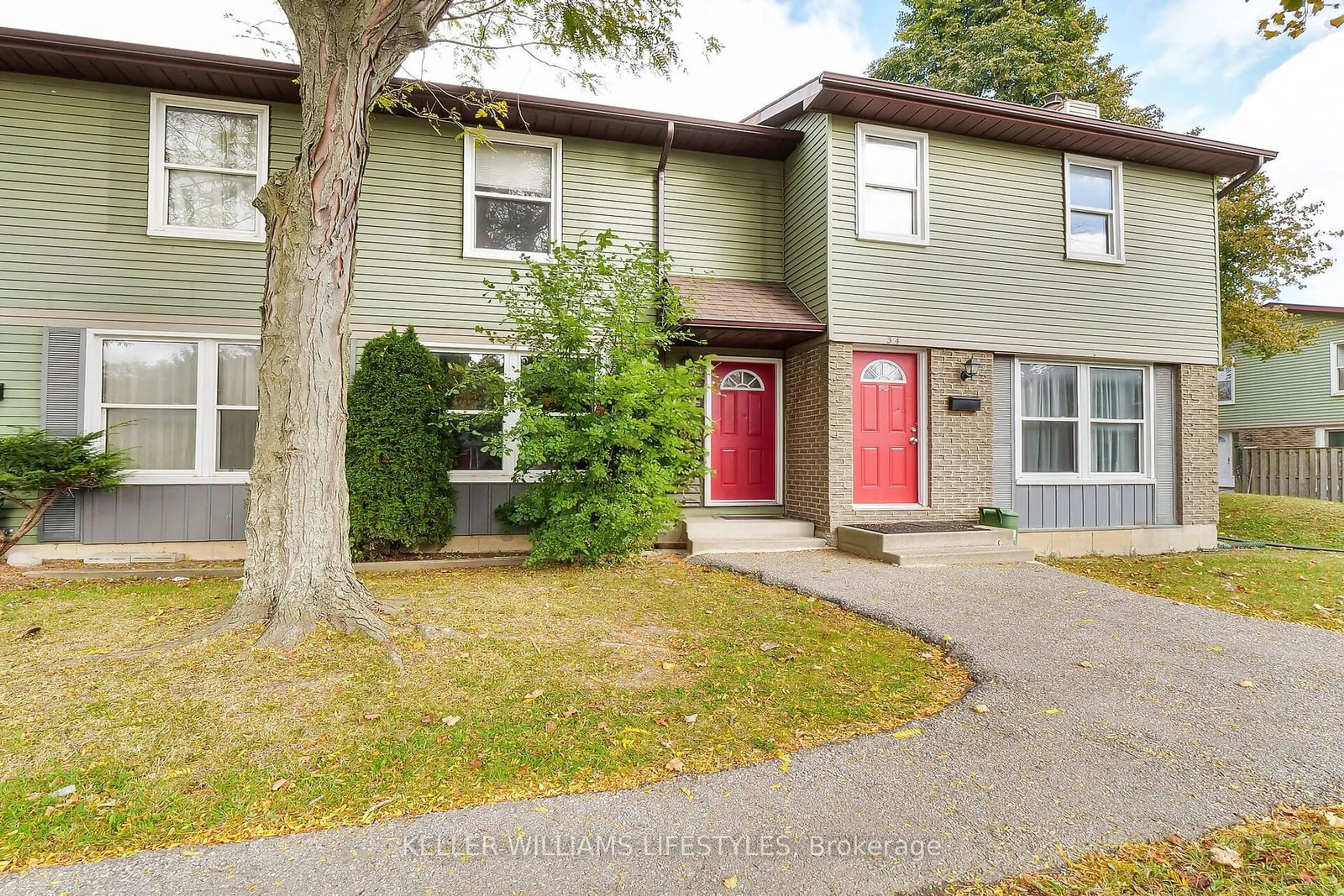 A pic from exterior of the house or condo, the street view for 70 Fiddlers Green Rd #36, London Ontario N6H 4R4