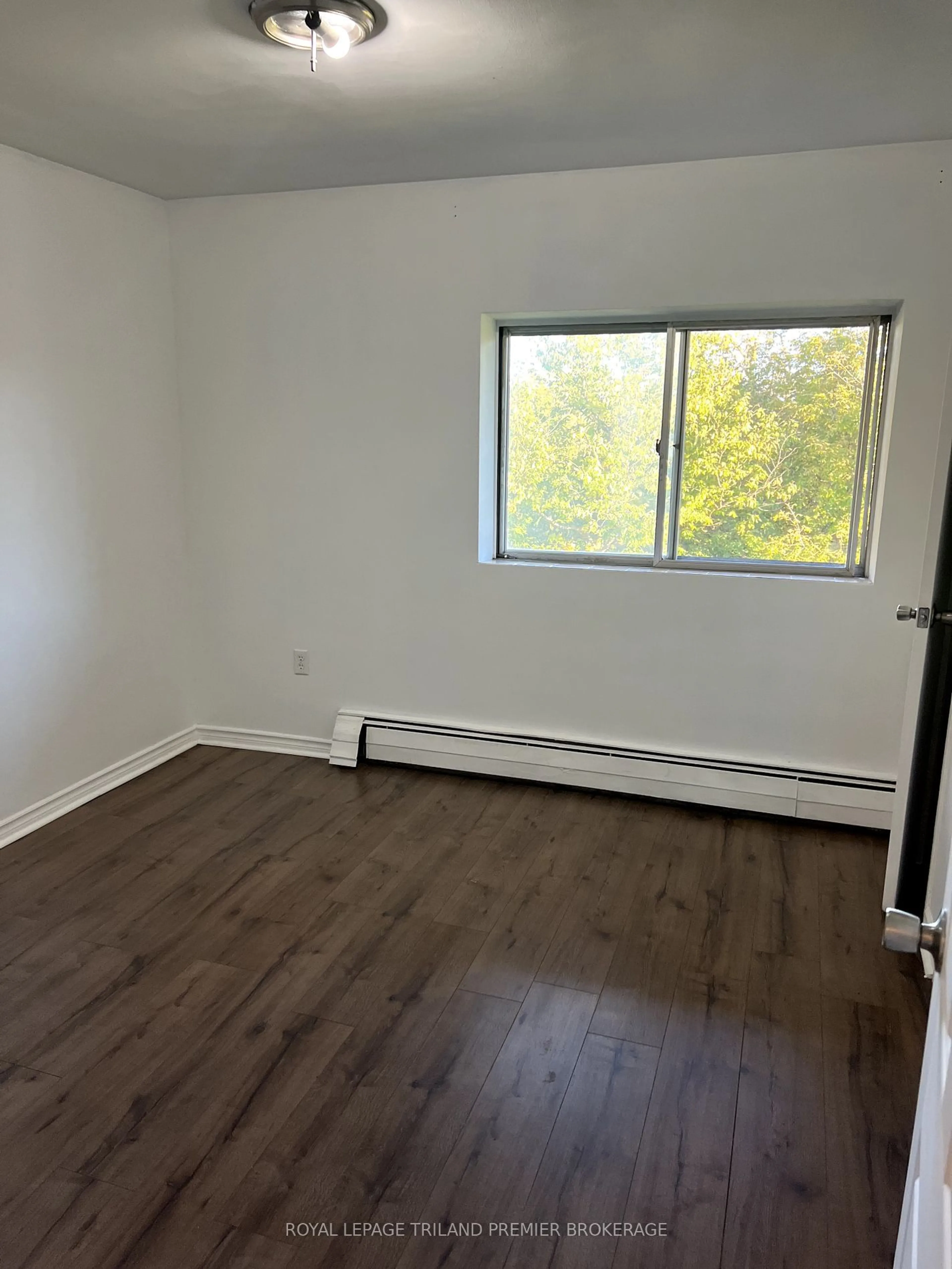 A pic of a room, wood floors for 1174 Hamilton Rd #303, London Ontario N5W 1A9