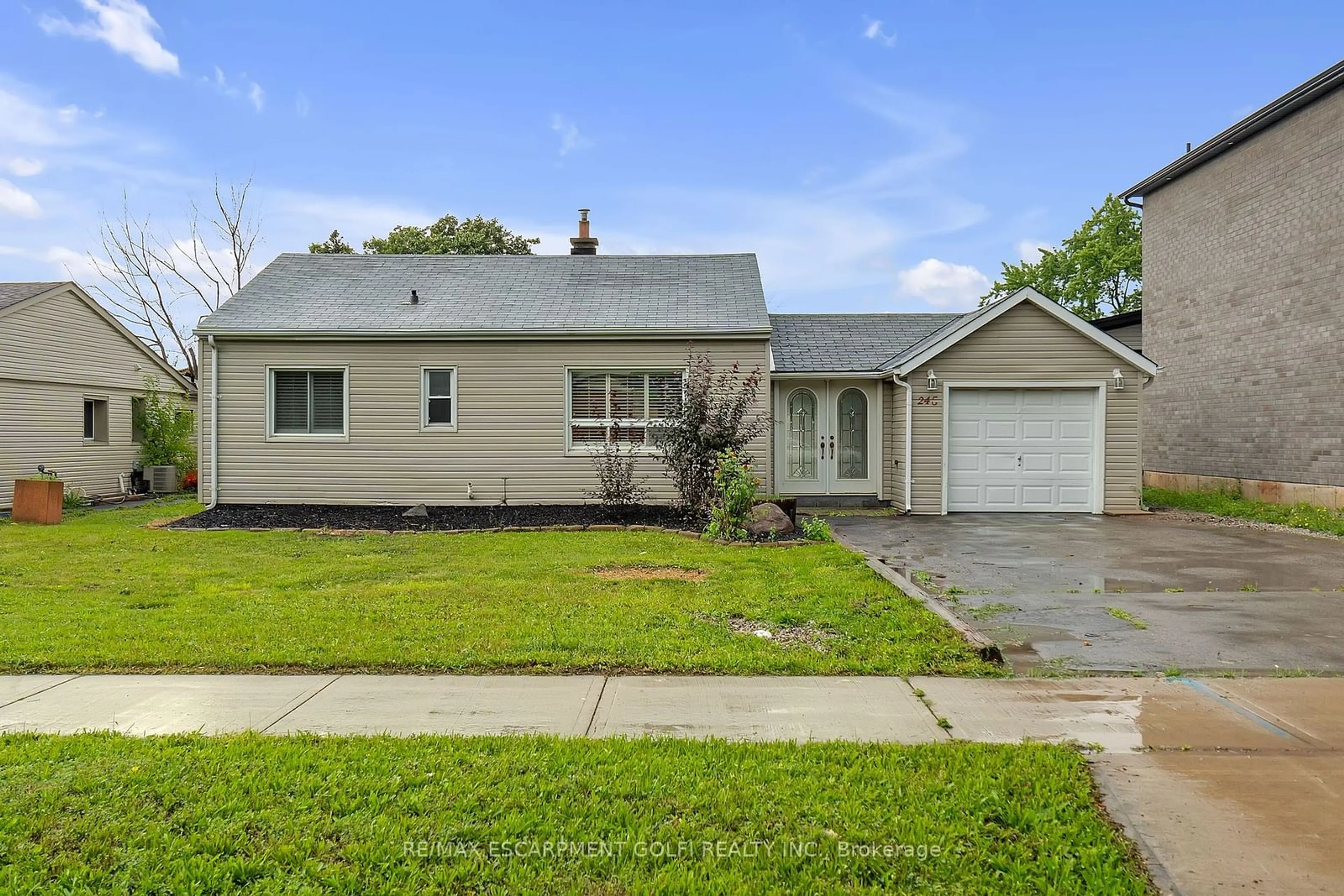 Frontside or backside of a home, the street view for 245 Cedardale Ave, Hamilton Ontario L8E 1S1