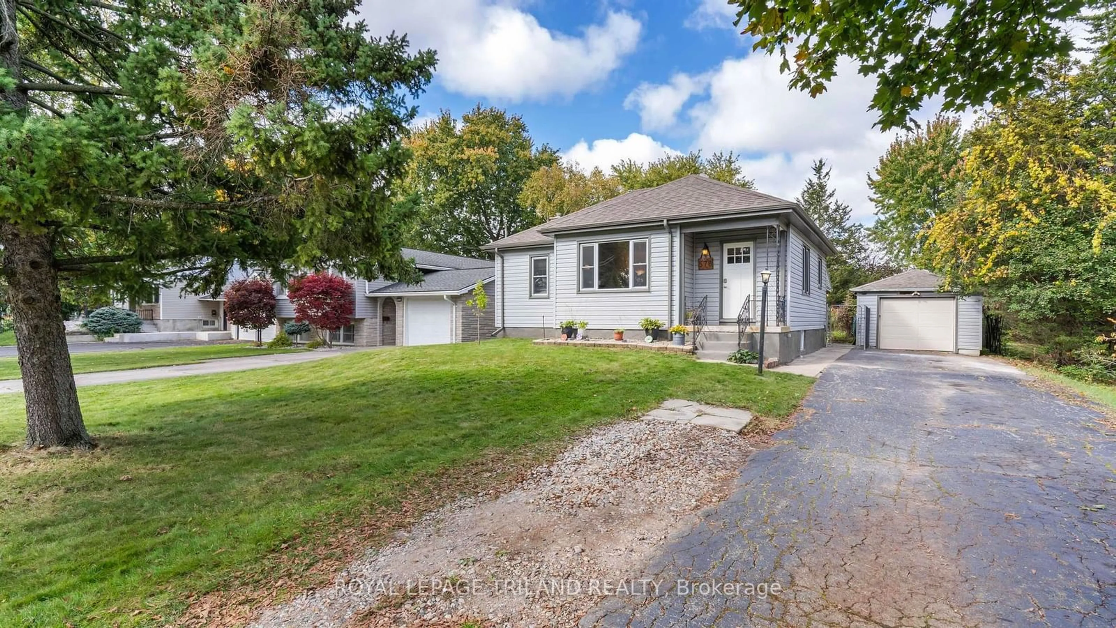 Frontside or backside of a home, the fenced backyard for 578 Creston Ave, London Ontario N6C 3A6