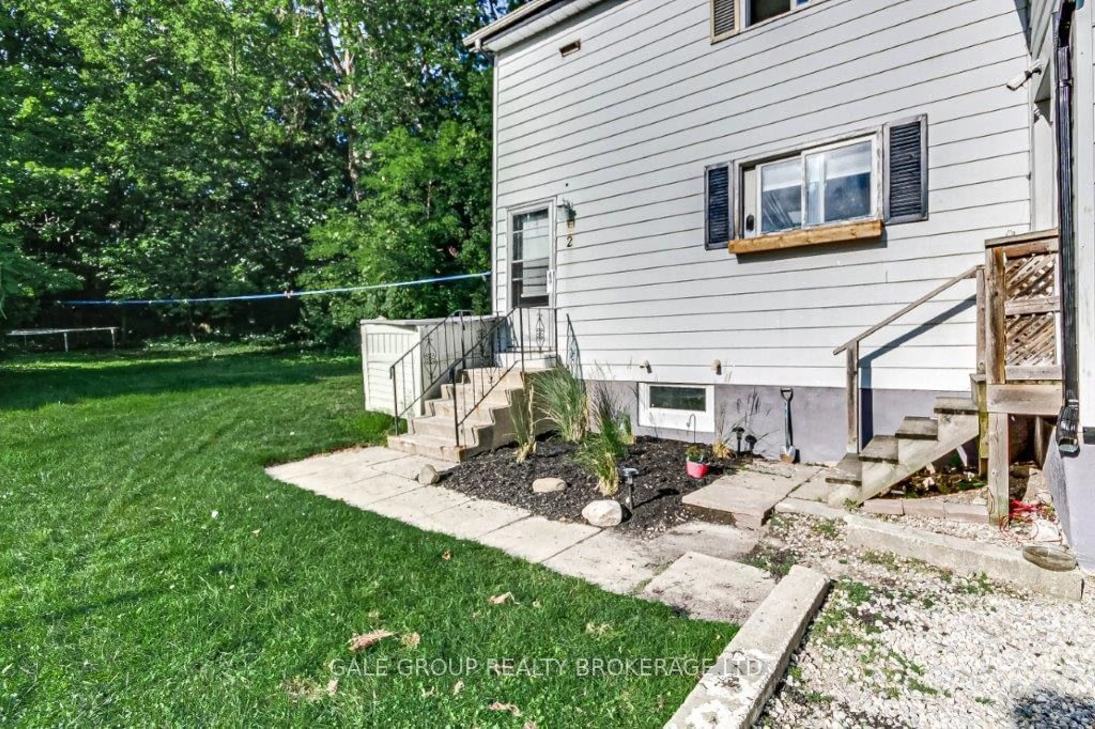 A pic from exterior of the house or condo, the fenced backyard for 751 Nelson St, Woodstock Ontario N4S 4J2