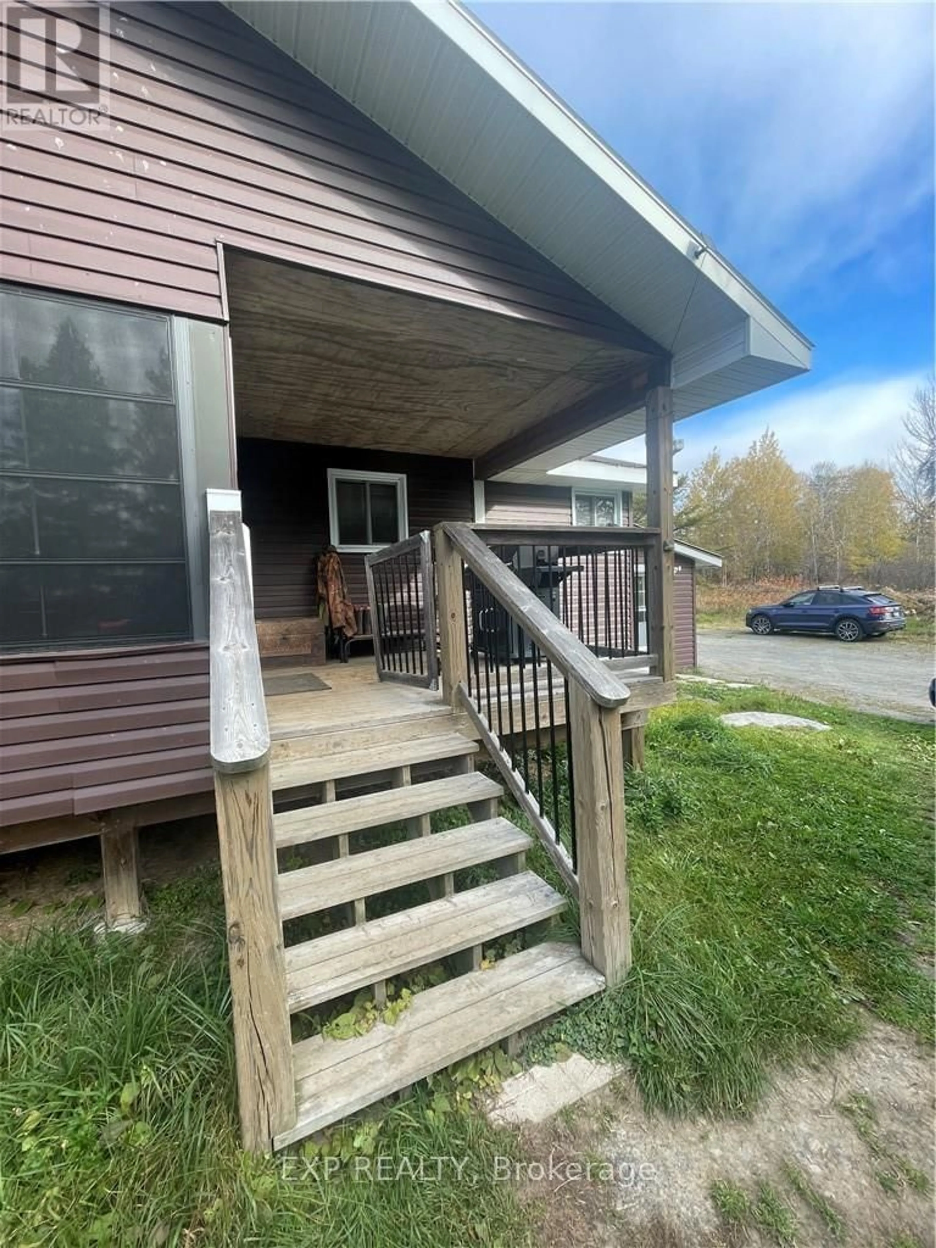 Frontside or backside of a home, the front or back of building for 214 Beauparlant Rd, St. Charles Ontario P0H 2W0